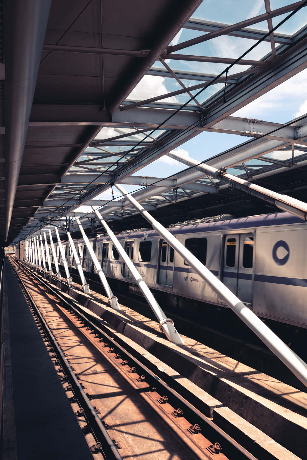 Taking A Train Ride Through The Bustling City Background