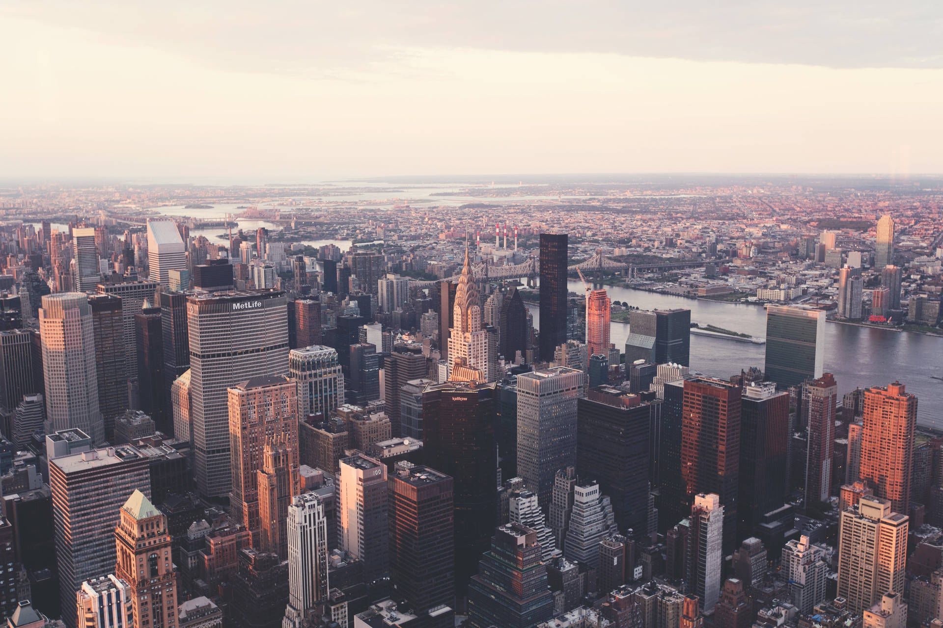 Taking In The Bright Lights And Big Apple Of New York City Background