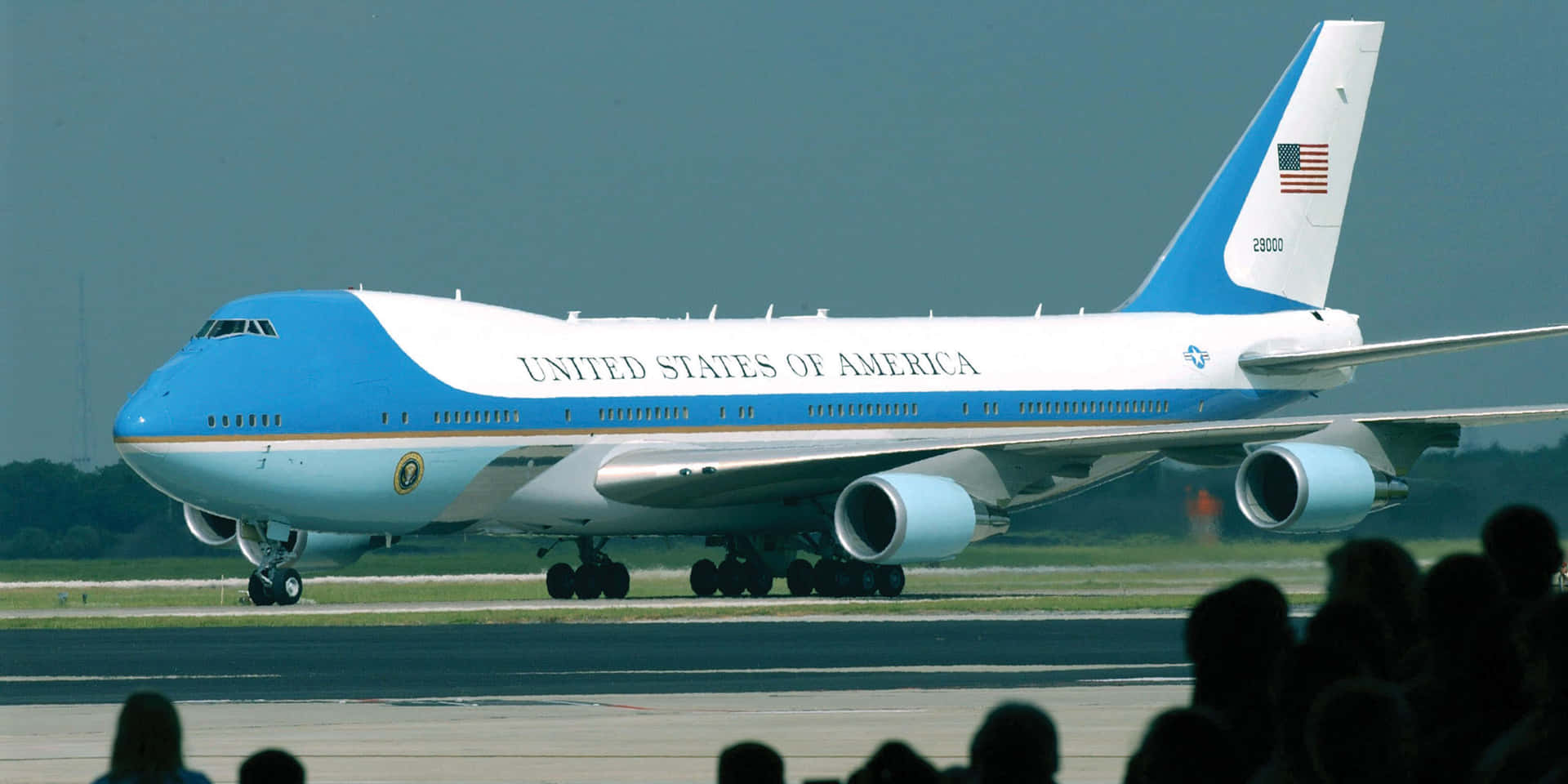 Taking To The Skies With Imposing Jumbo Jets Background