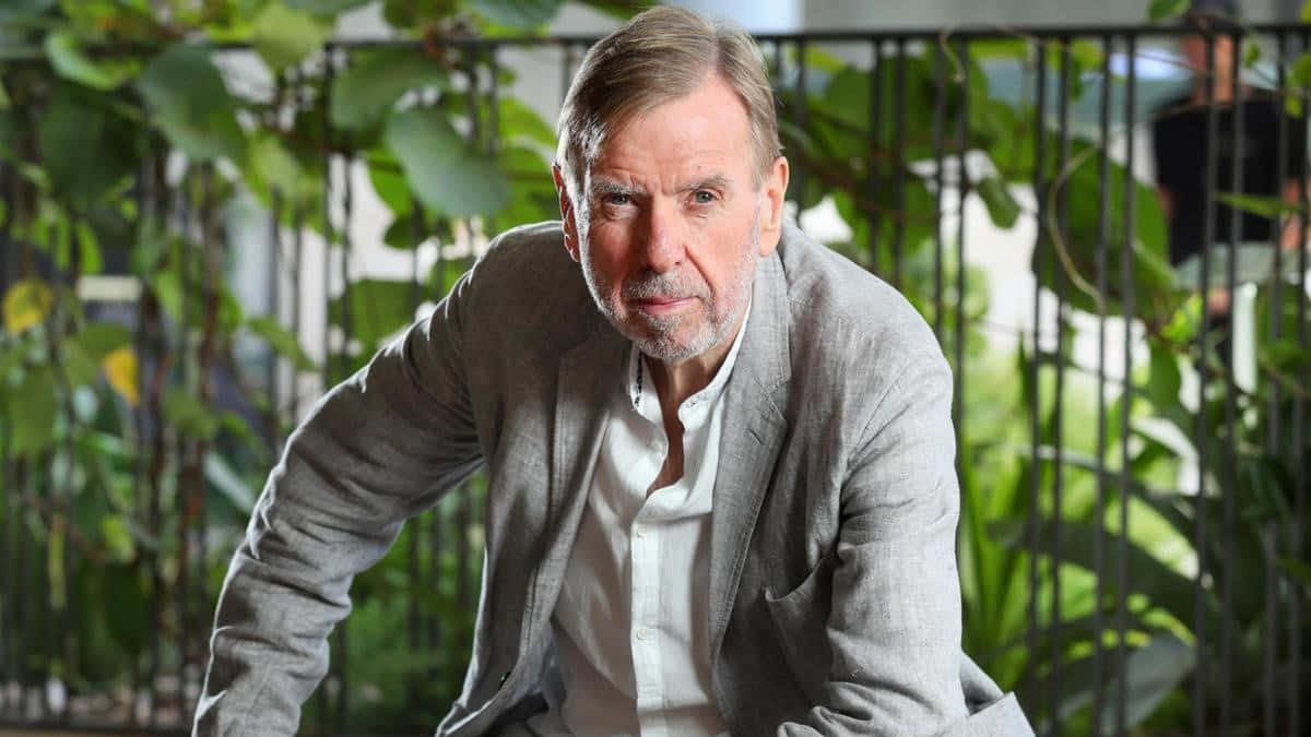 Talented British Actor Timothy Spall Posing For A Portrait. Background