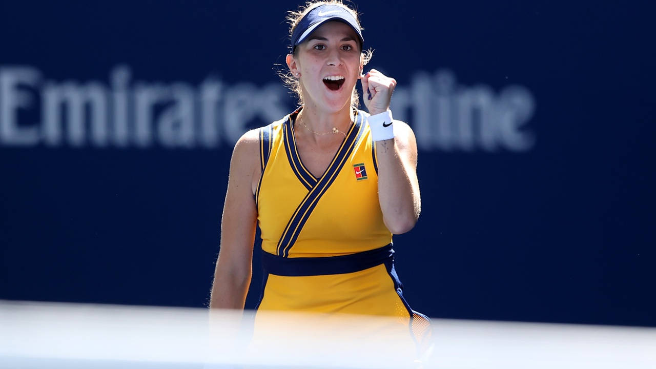 Talented Tennis Star Belinda Bencic In Action Background