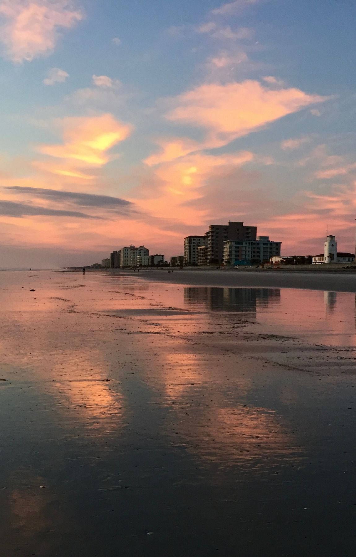 Tall Building On Beach Sunrise Background