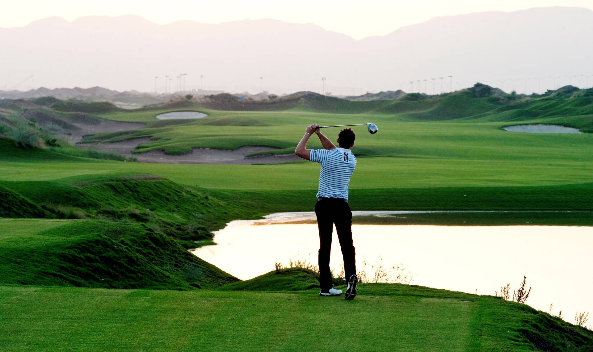 Tall Man Golfing Desktop