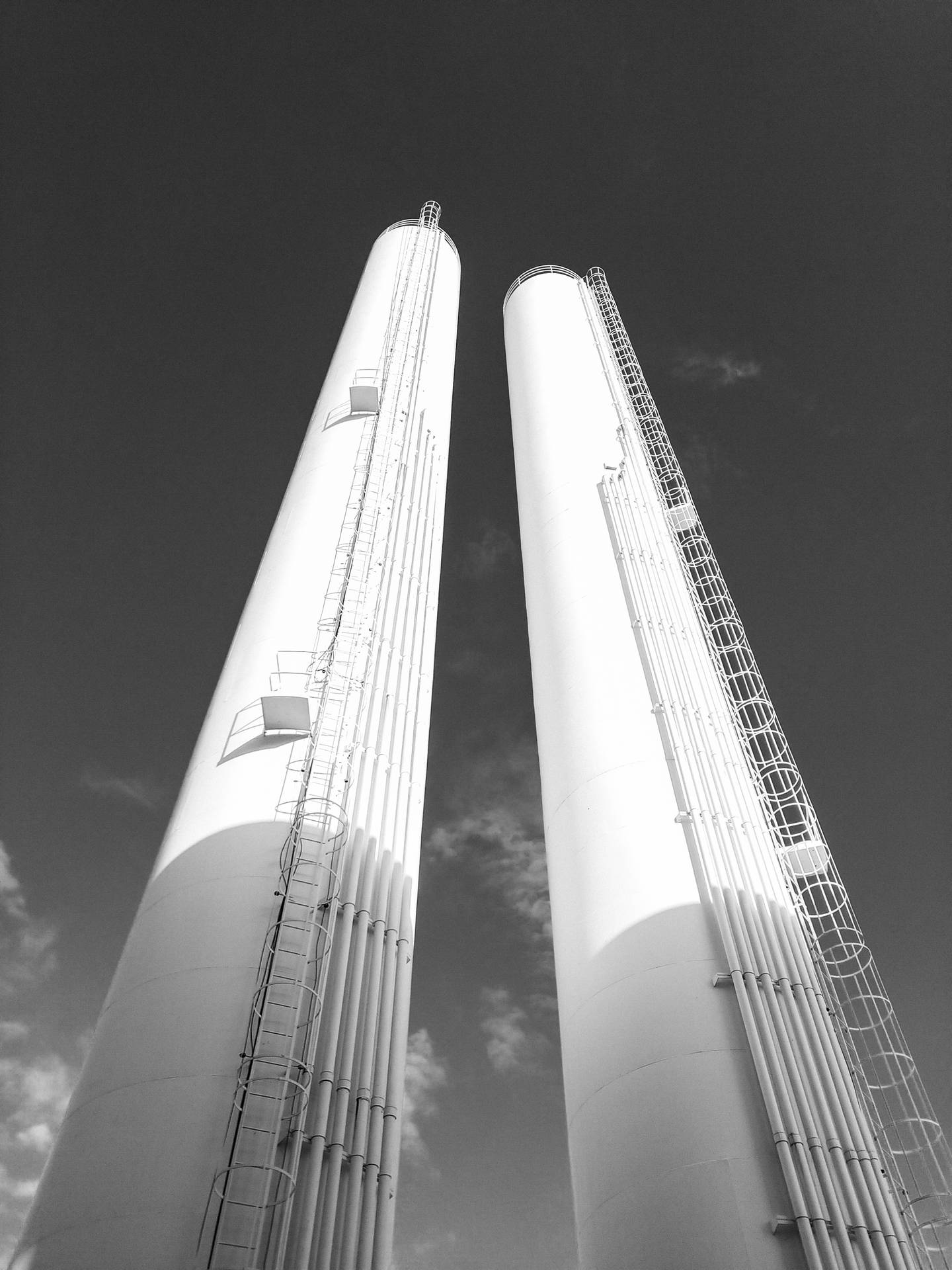 Tall Tower Tanks In Rio Background