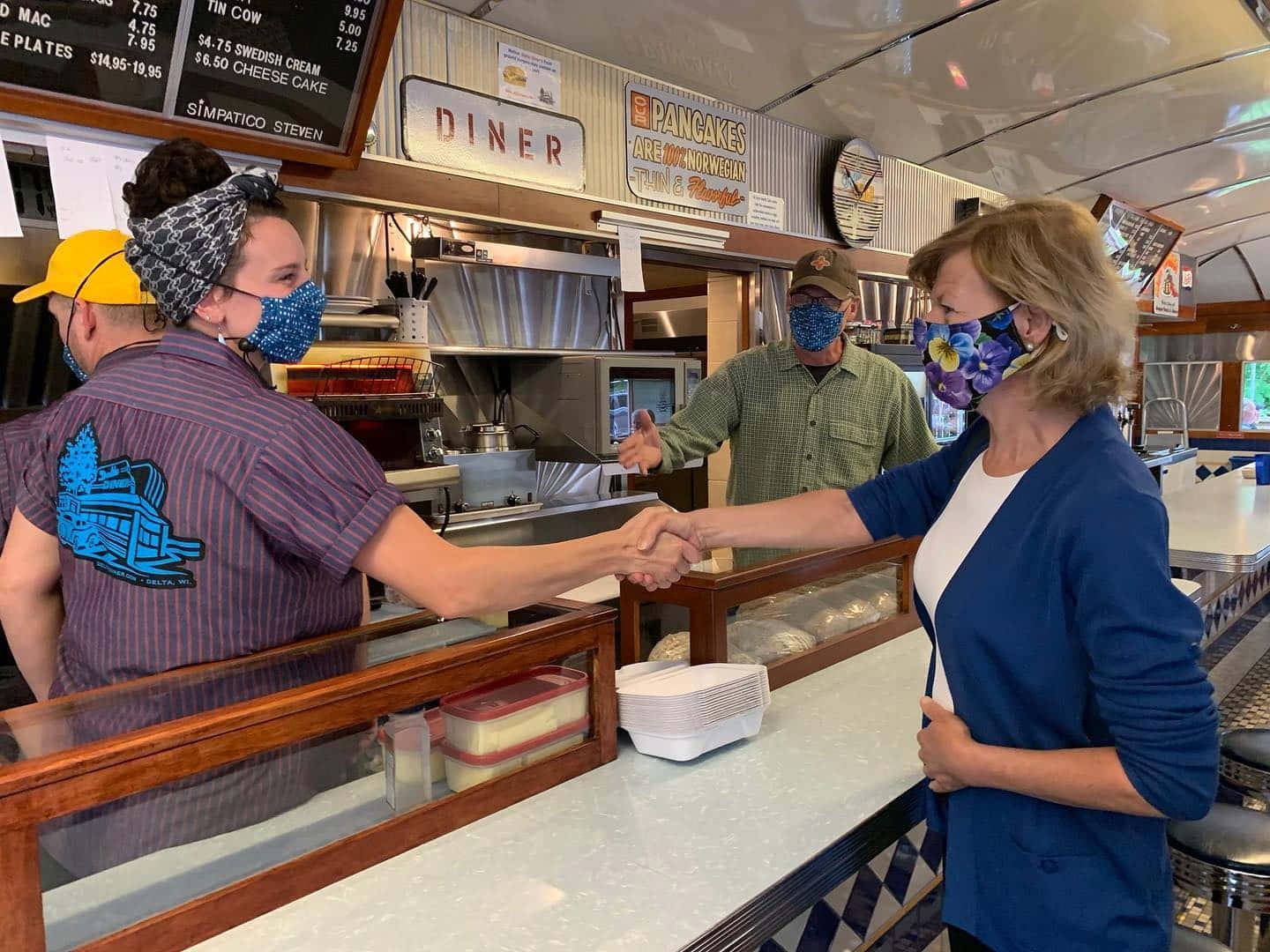 Tammy Baldwin In Diner Background
