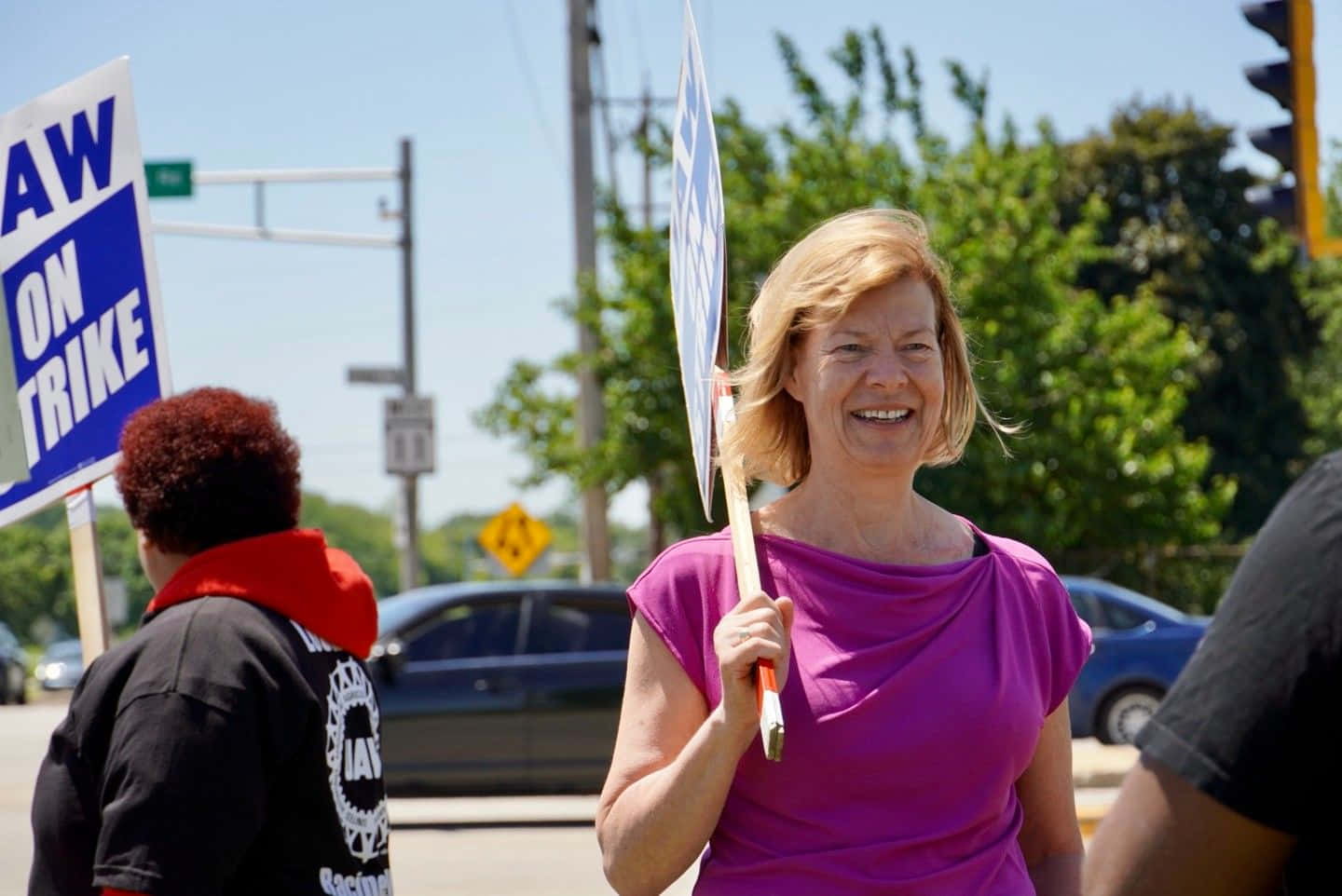 Tammy Baldwin Supporting Strikers Background