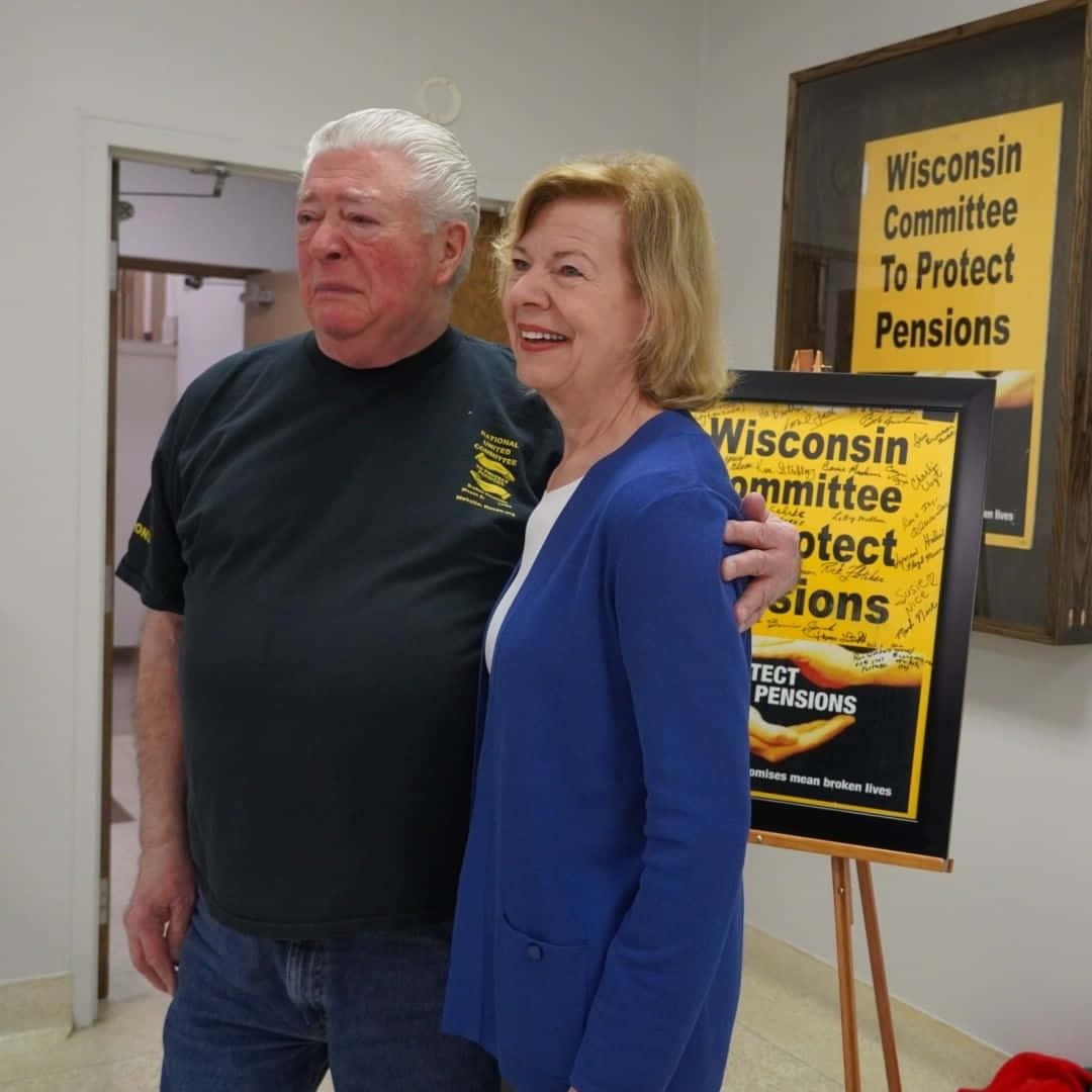 Tammy Baldwin With Retiree Background