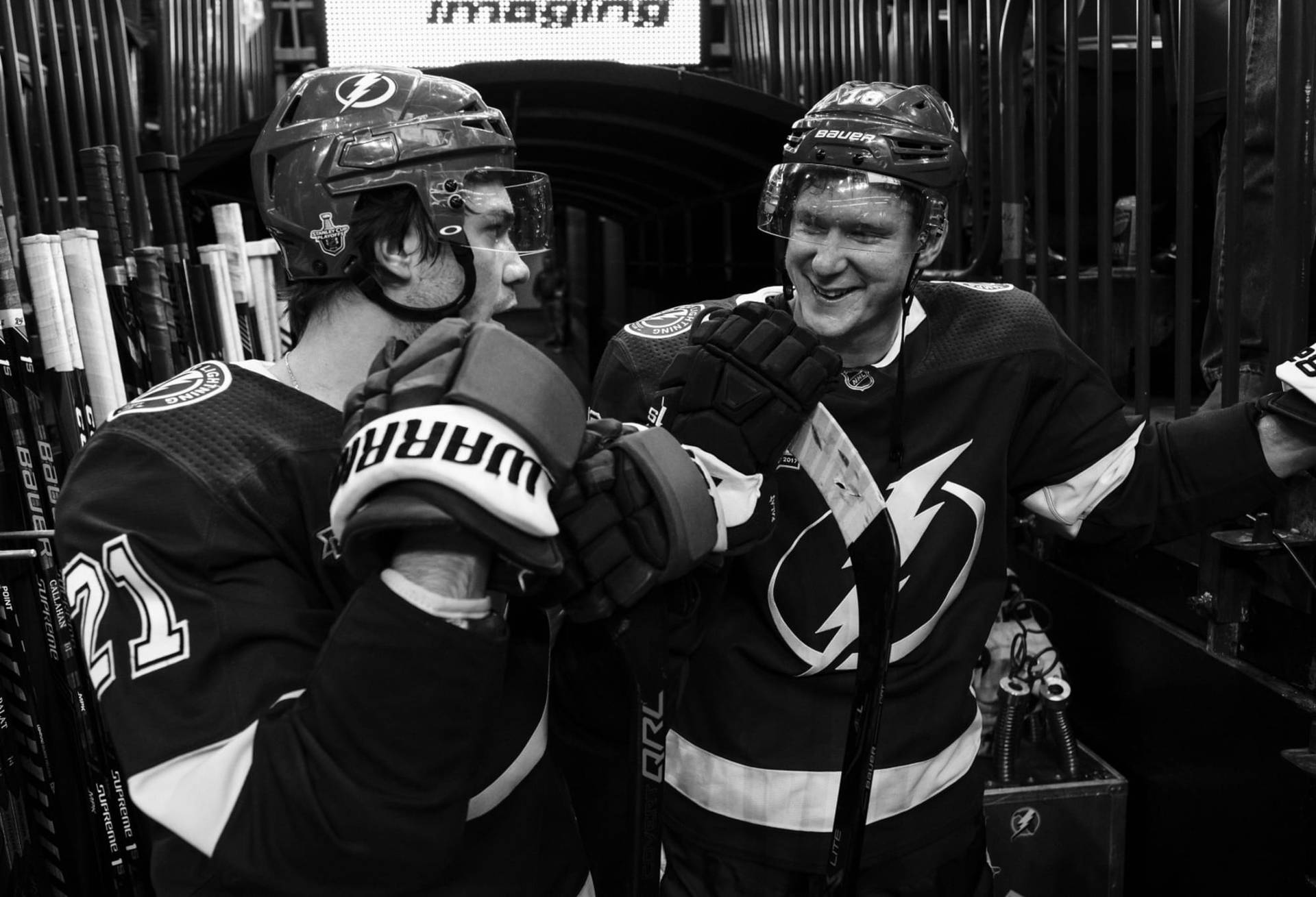 Tampa Bay Lightning Superstars – Brayden Point And Ondrej Palat In Action Background