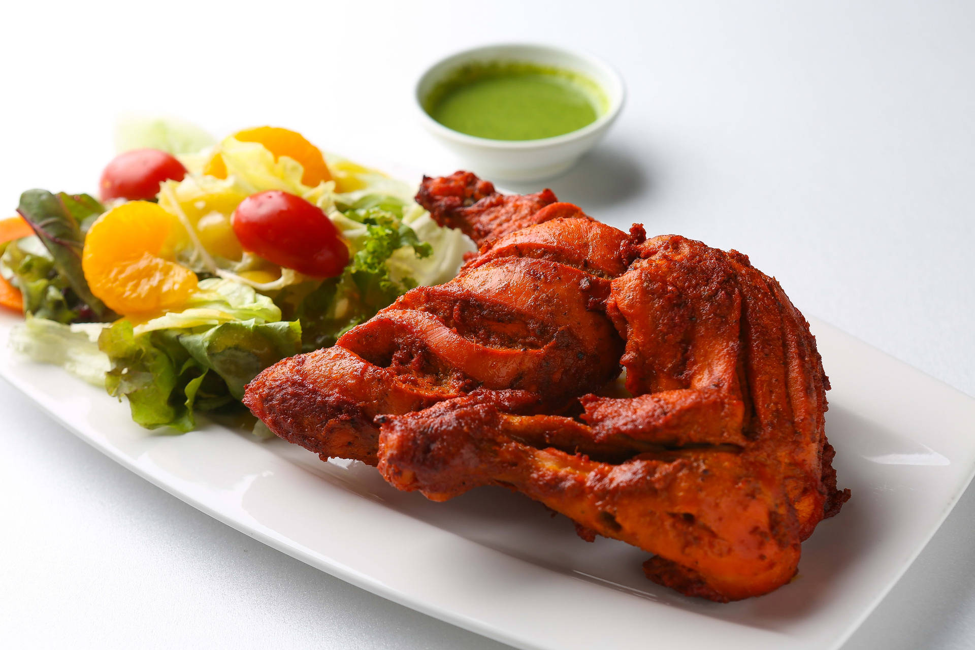 Tandoori Chicken Served With Fresh Salad Background