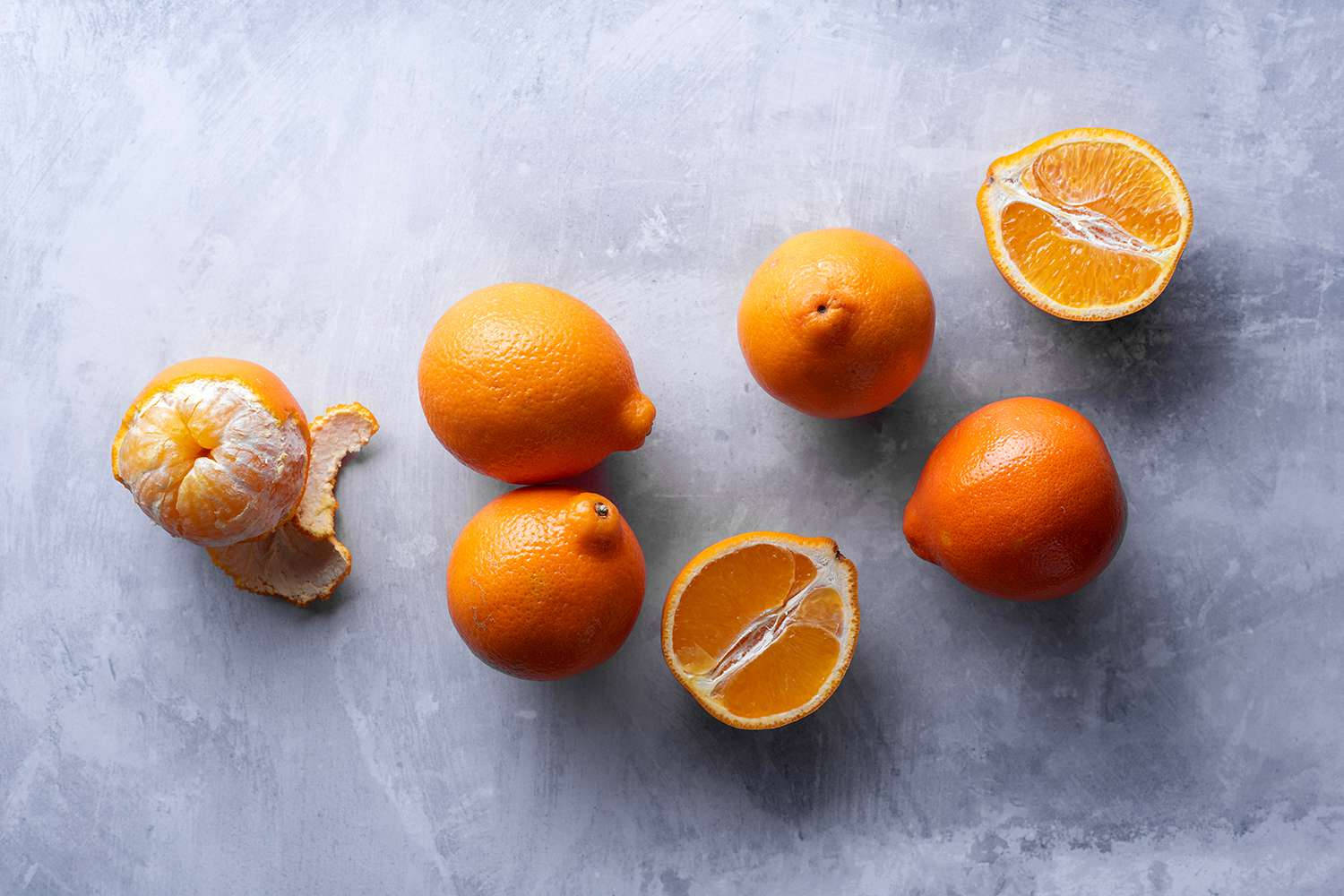 Tangelo Fruits Cement Gray Table Background