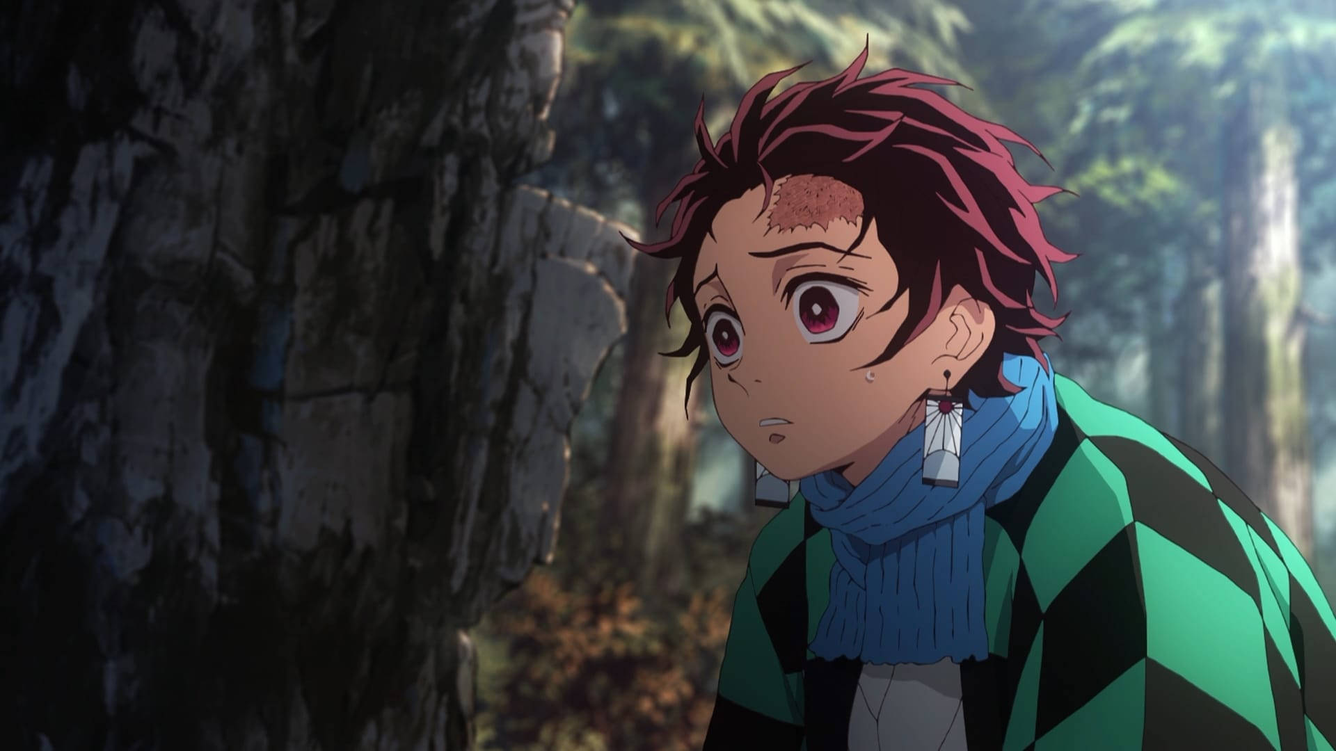 Tanjiro Bravely Ventures Into A Dark Forest On His Mission To Become A Demon Slayer Background