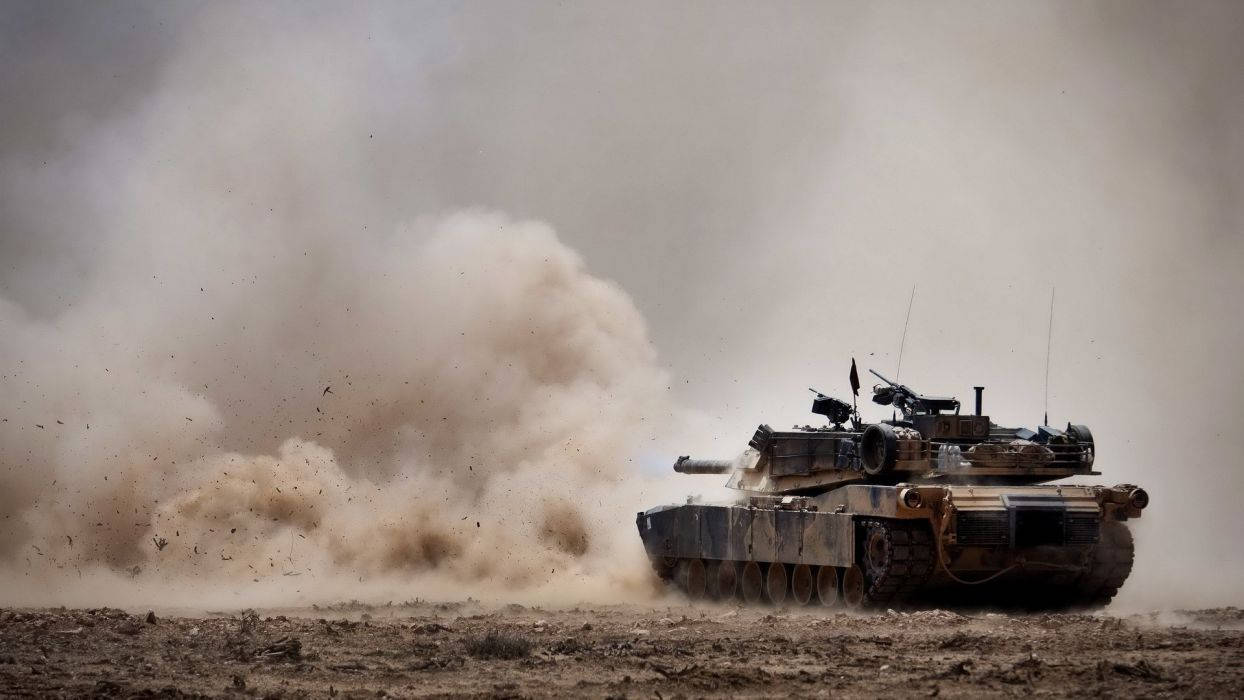 Tank In Dusty Field Background