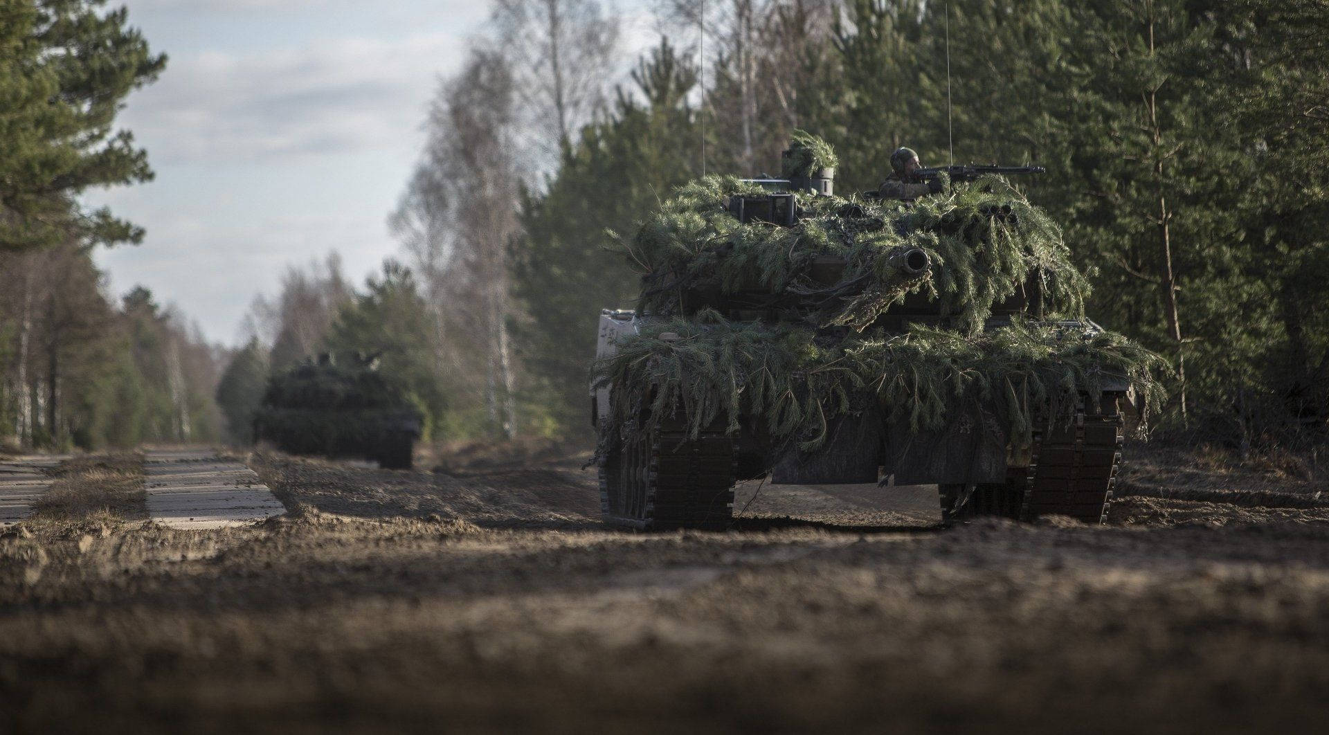 Tanks With Bush Ghillie Cover Background