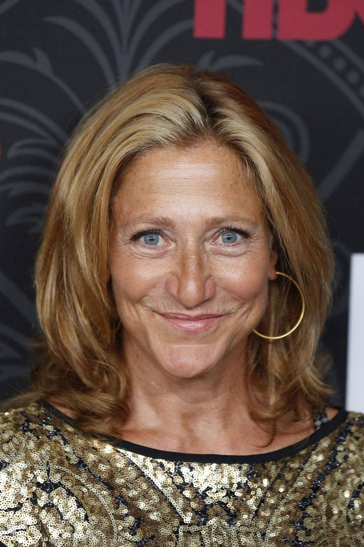 Tanned Edie Falco