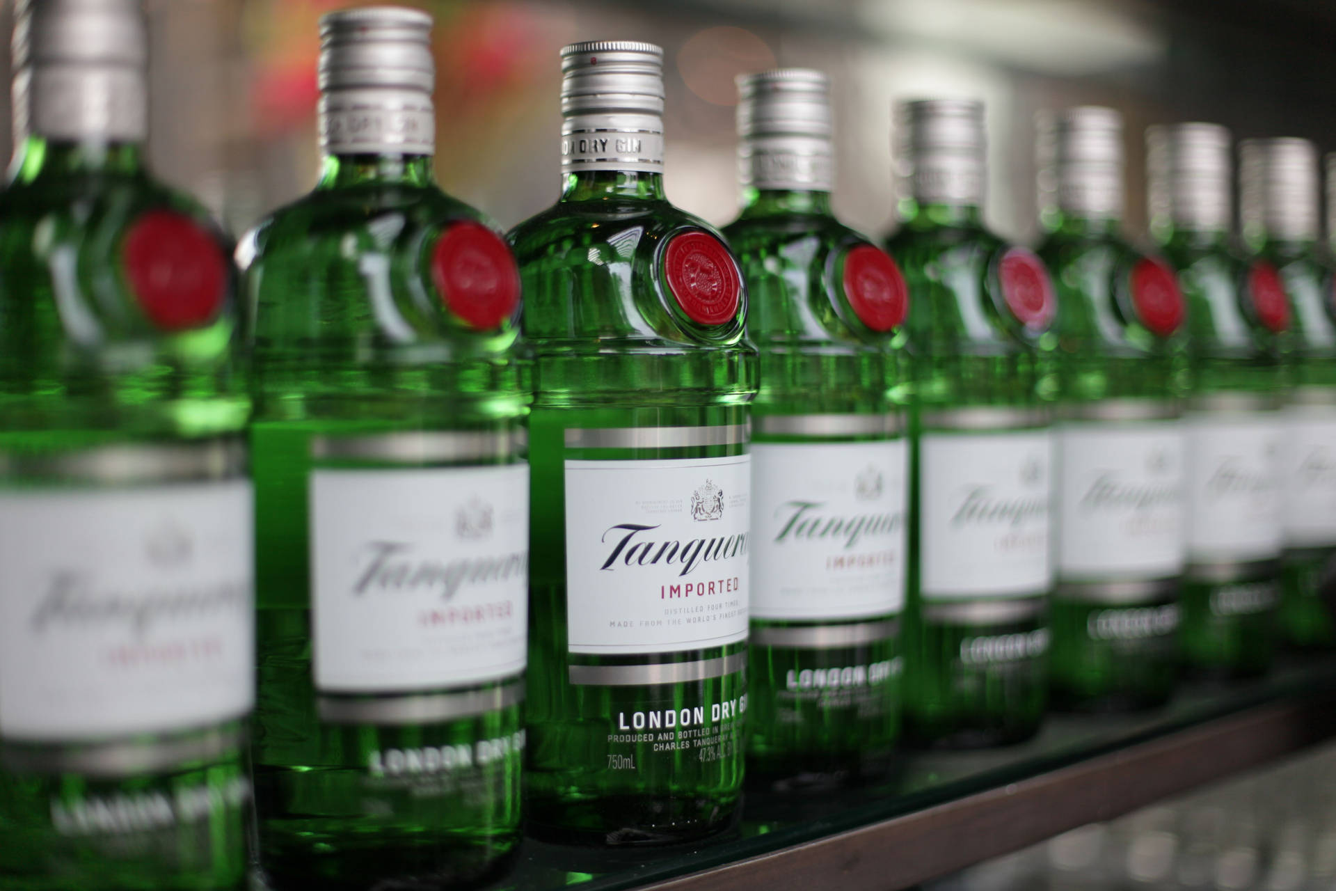 Tanqueray Gin Bottles Lined Up