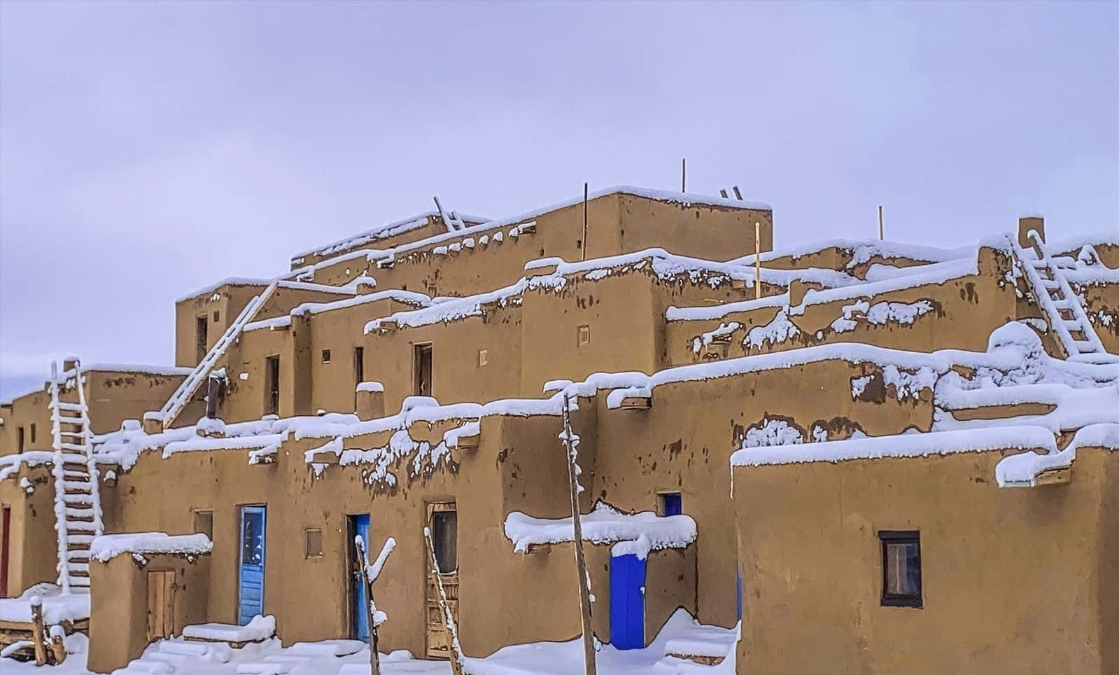 Taos Pueblo Covered In Snow