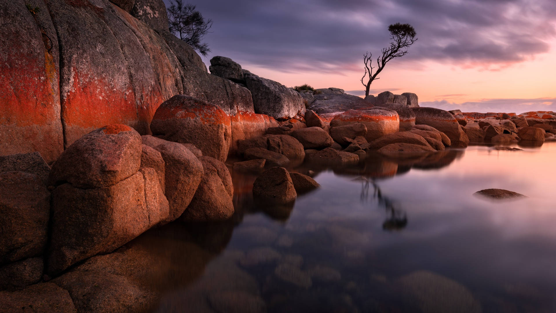 Tasmania Rocks Next To Lake Background