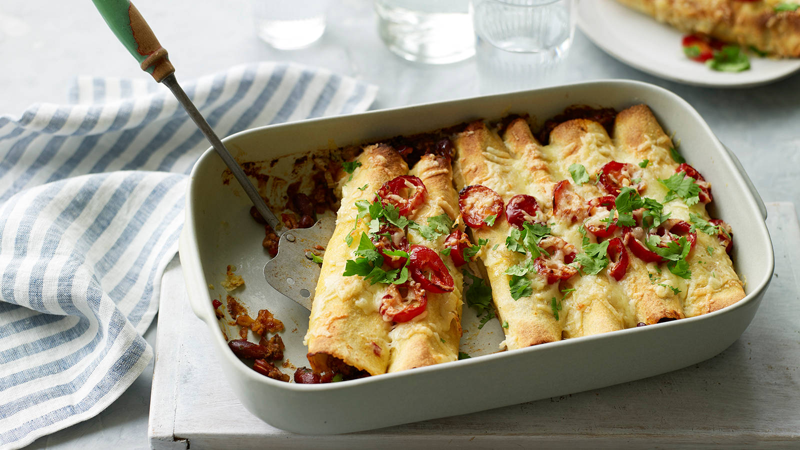 Tasty Cheesy Enchiladas Rolls Background