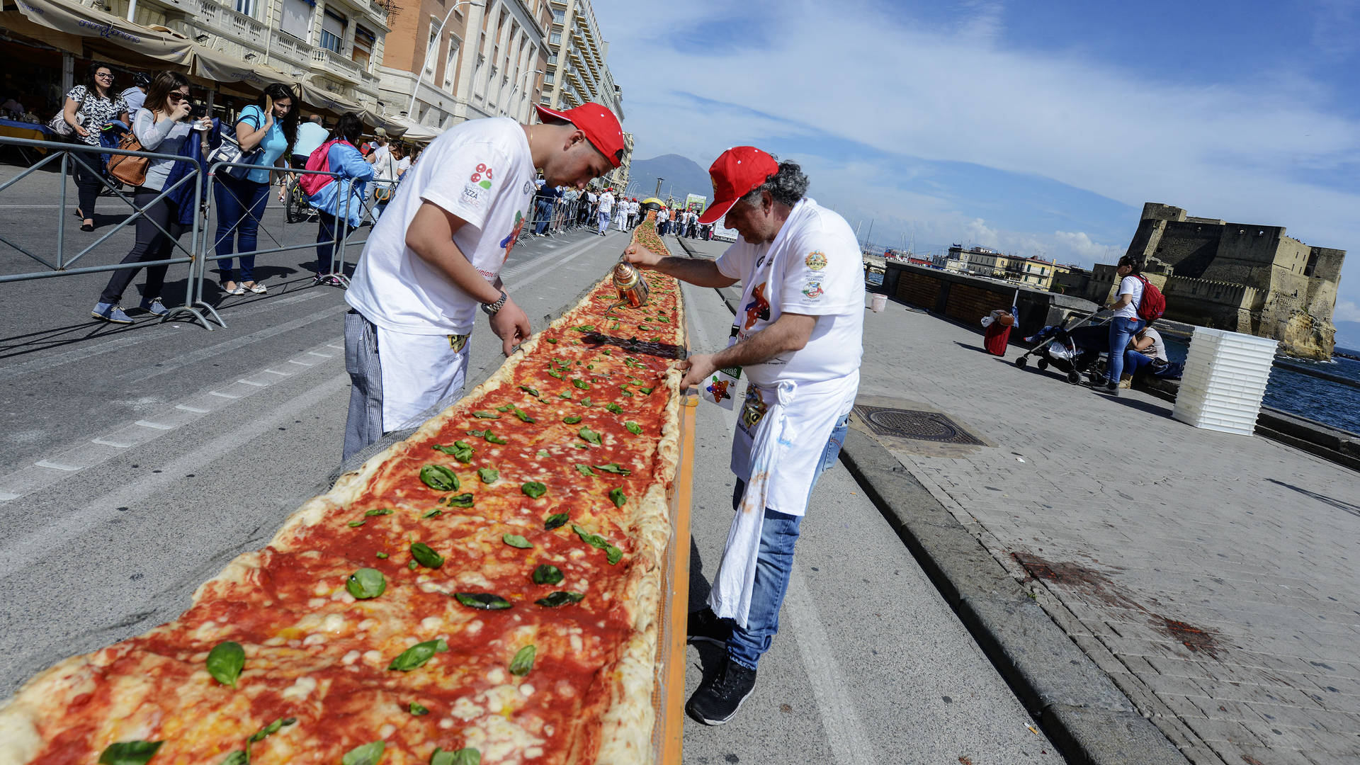 Tasty Longest Pizza Background