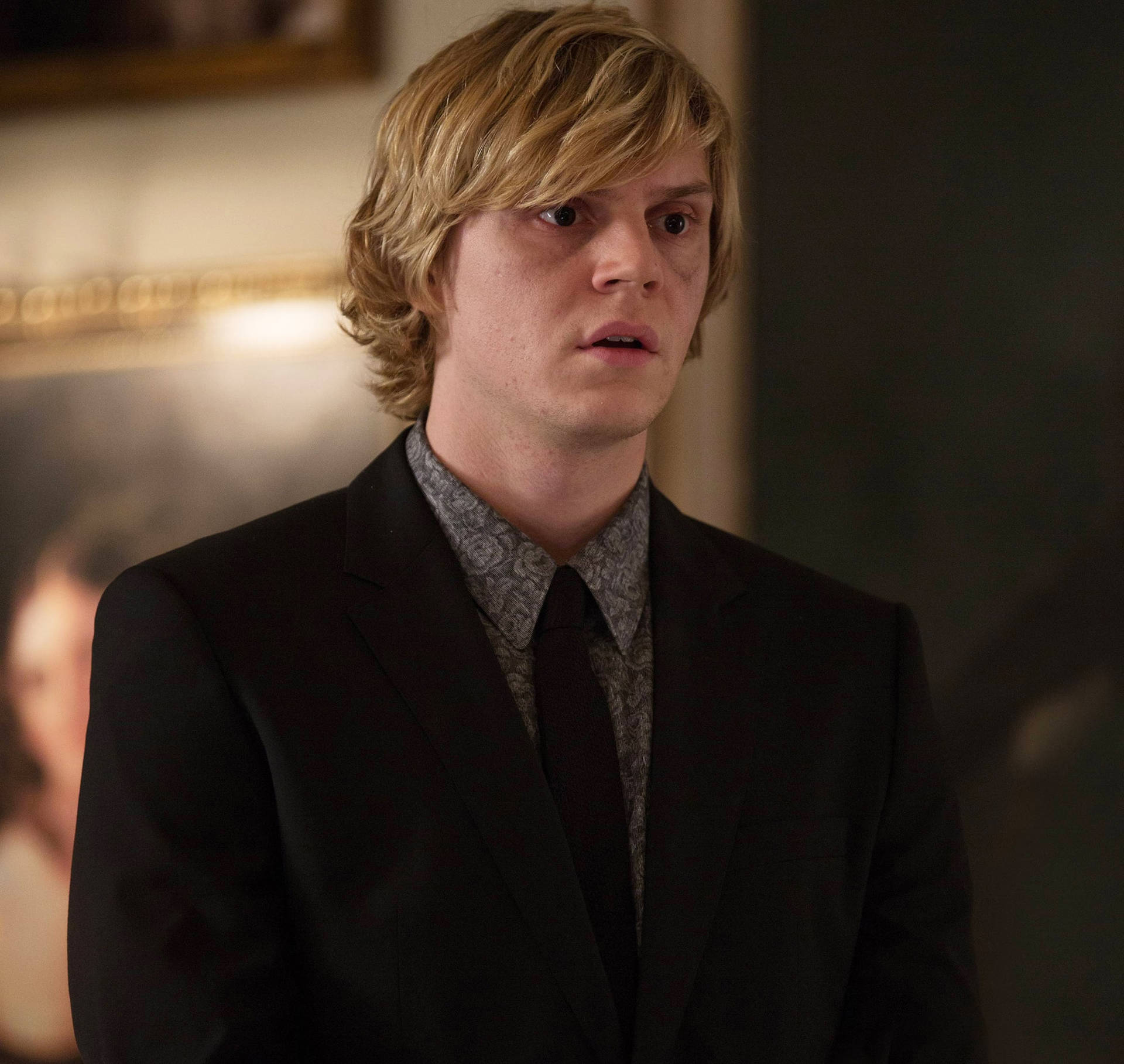 Tate Langdon In Suit Background