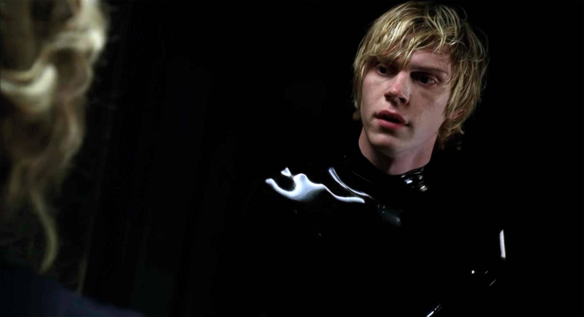 Tate Langdon Leather Suit Background