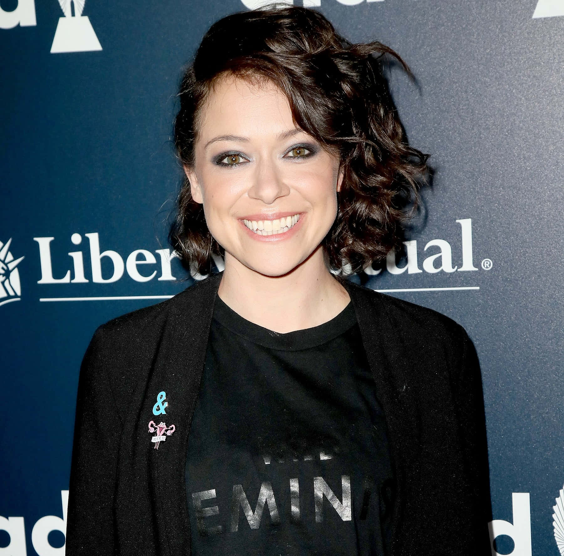 Tatiana Maslany Smiling Event Portrait Background