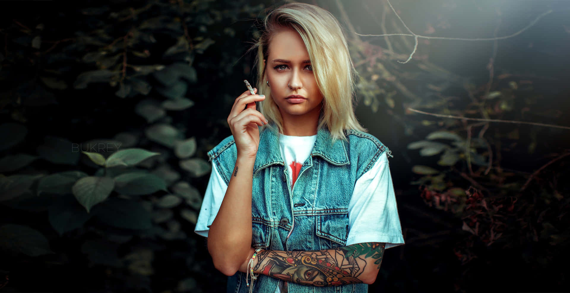 Tattooed Blonde Girl Smoking Background