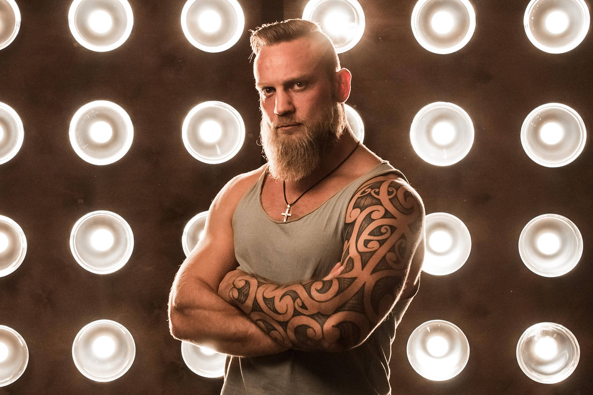 Tattooed Cool Boy With Lights Background