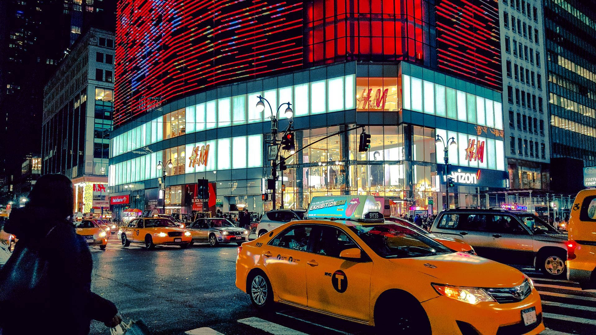 Taxi Against H&m Store At Night Background
