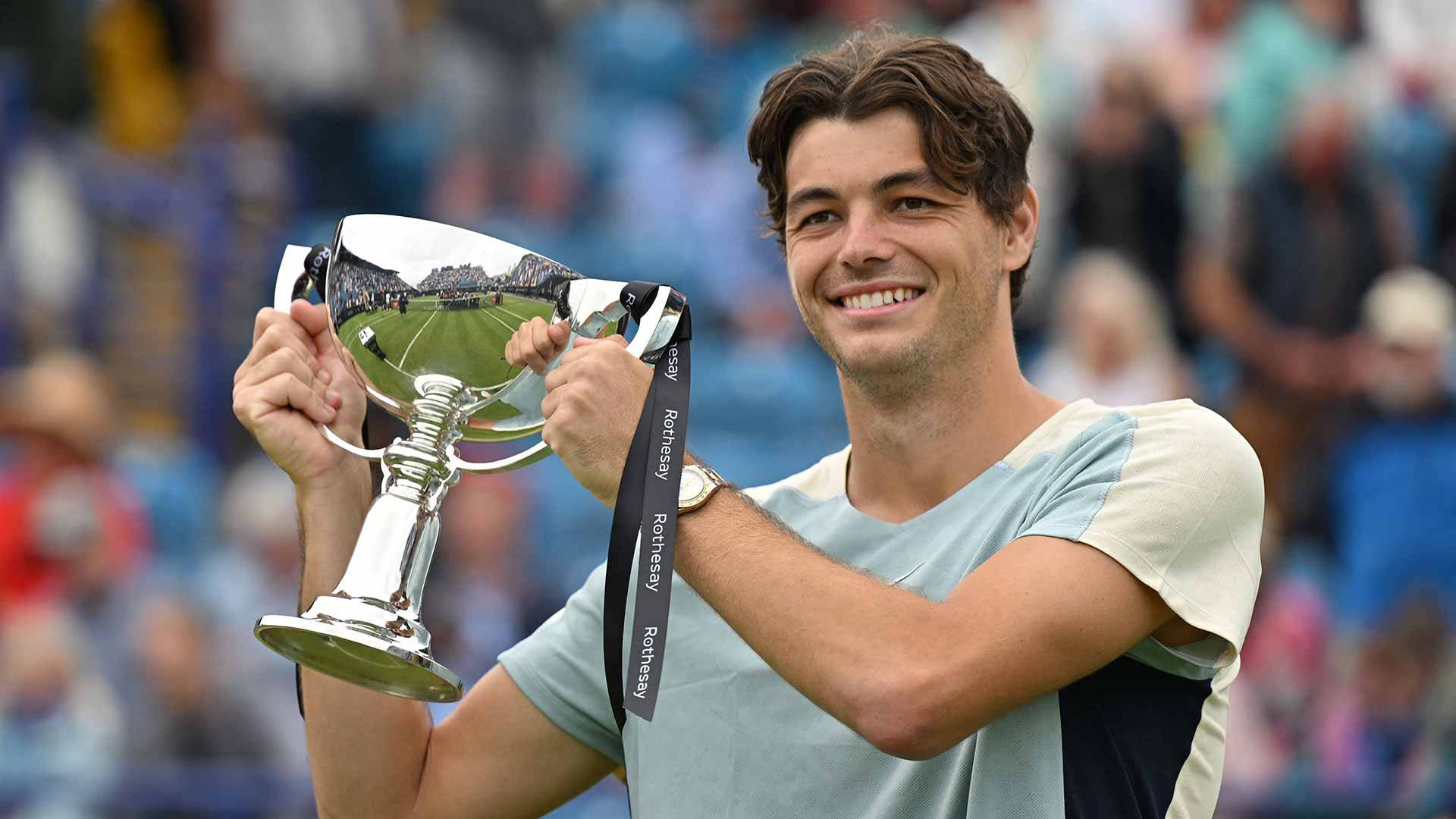 Taylor Fritz Flashing A Winning Smile Background