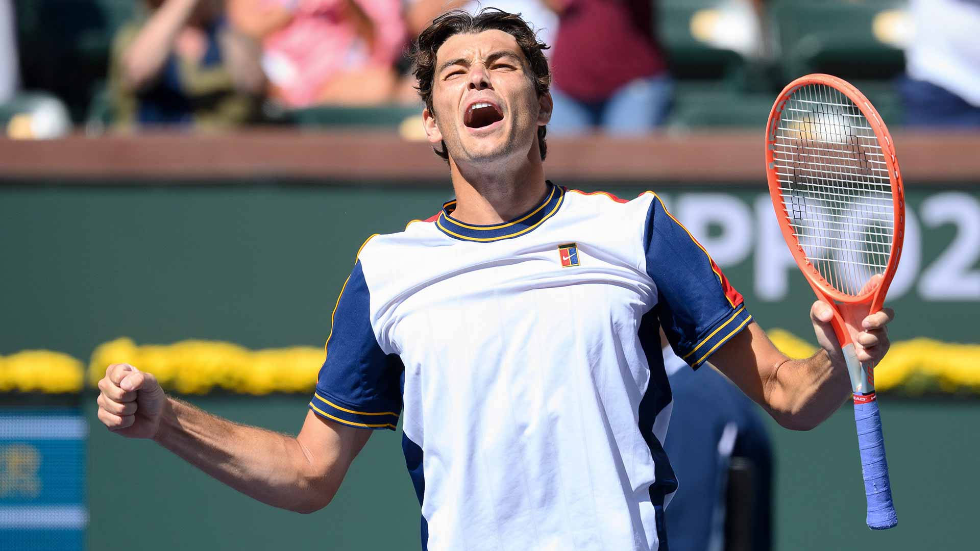 Taylor Fritz Shouting In Victory Background