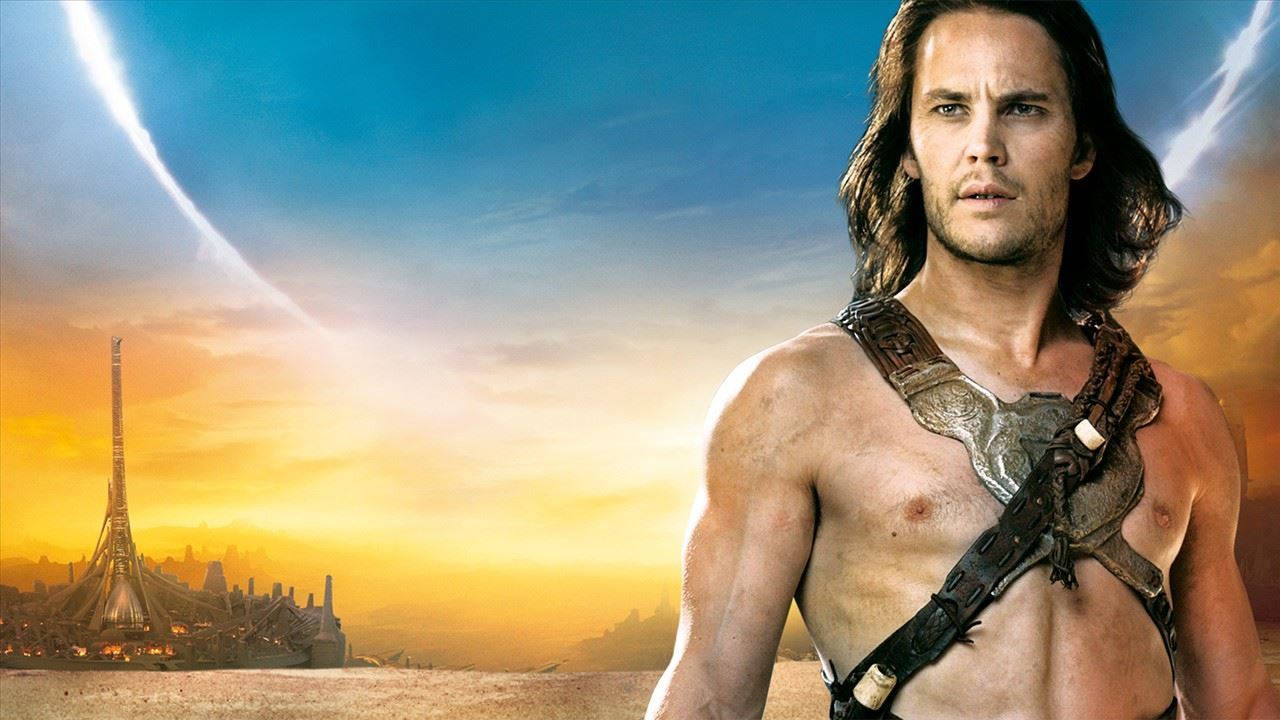Taylor Kitsch As John Carter In Action Background