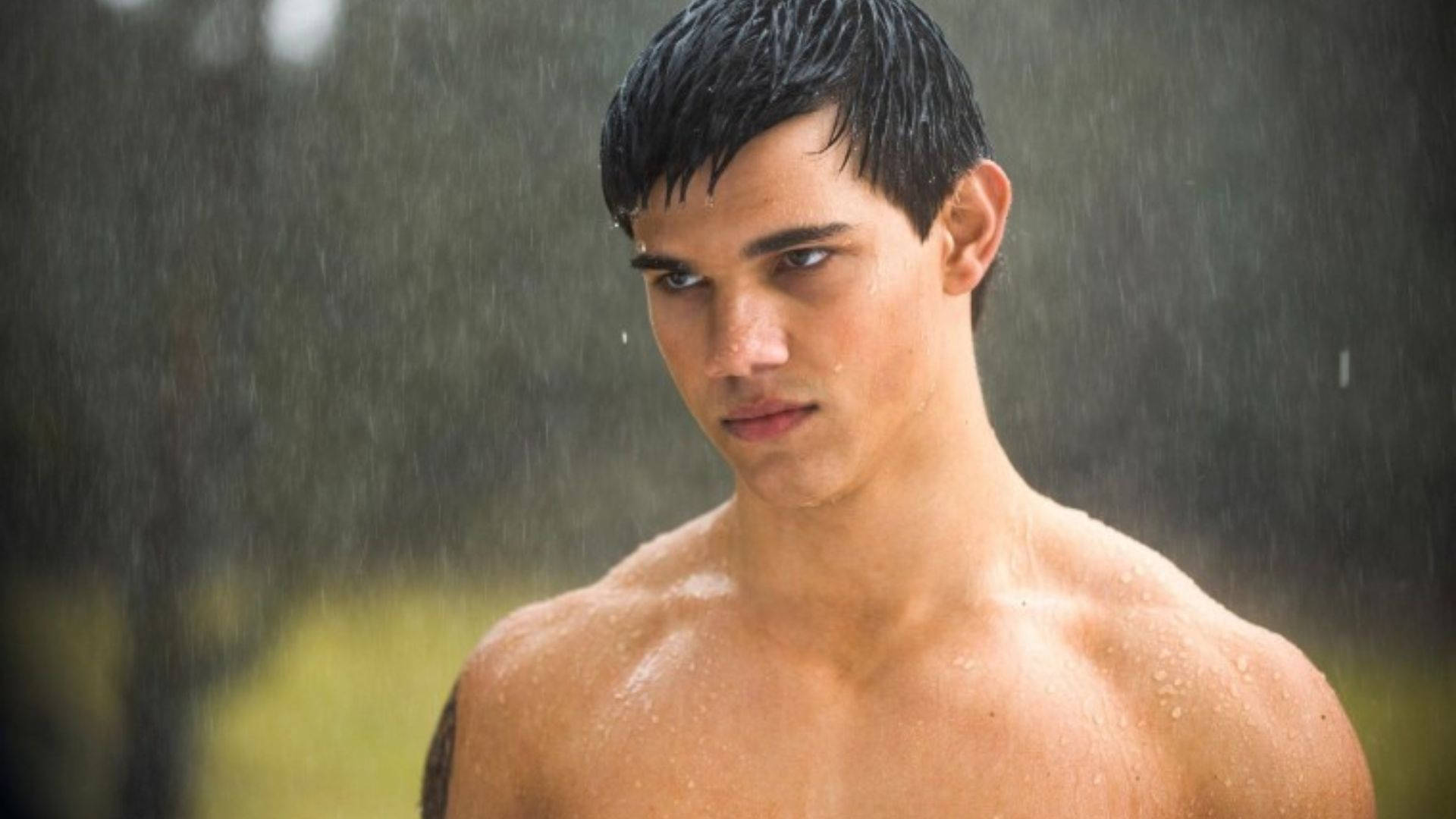 Taylor Lautner In The Rain Background