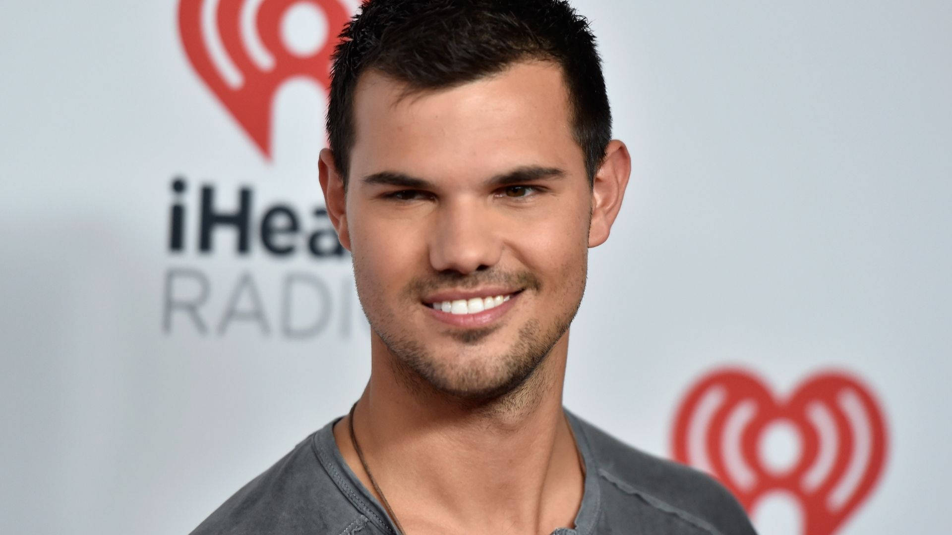 Taylor Lautner Sweet Smile Background
