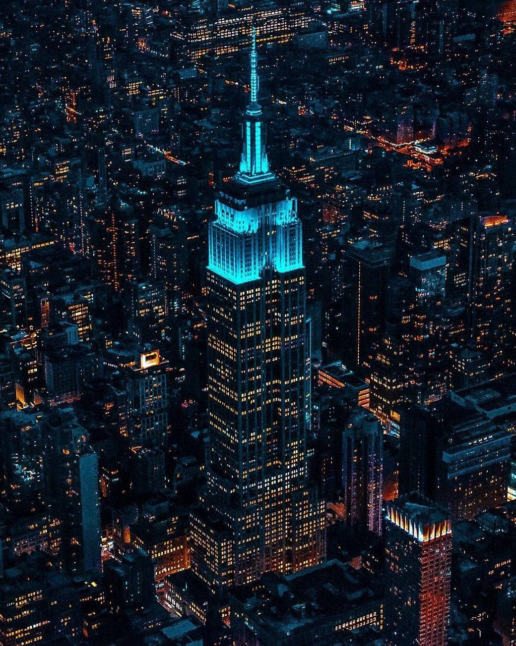 Teal Lights At The Empire State Building Background
