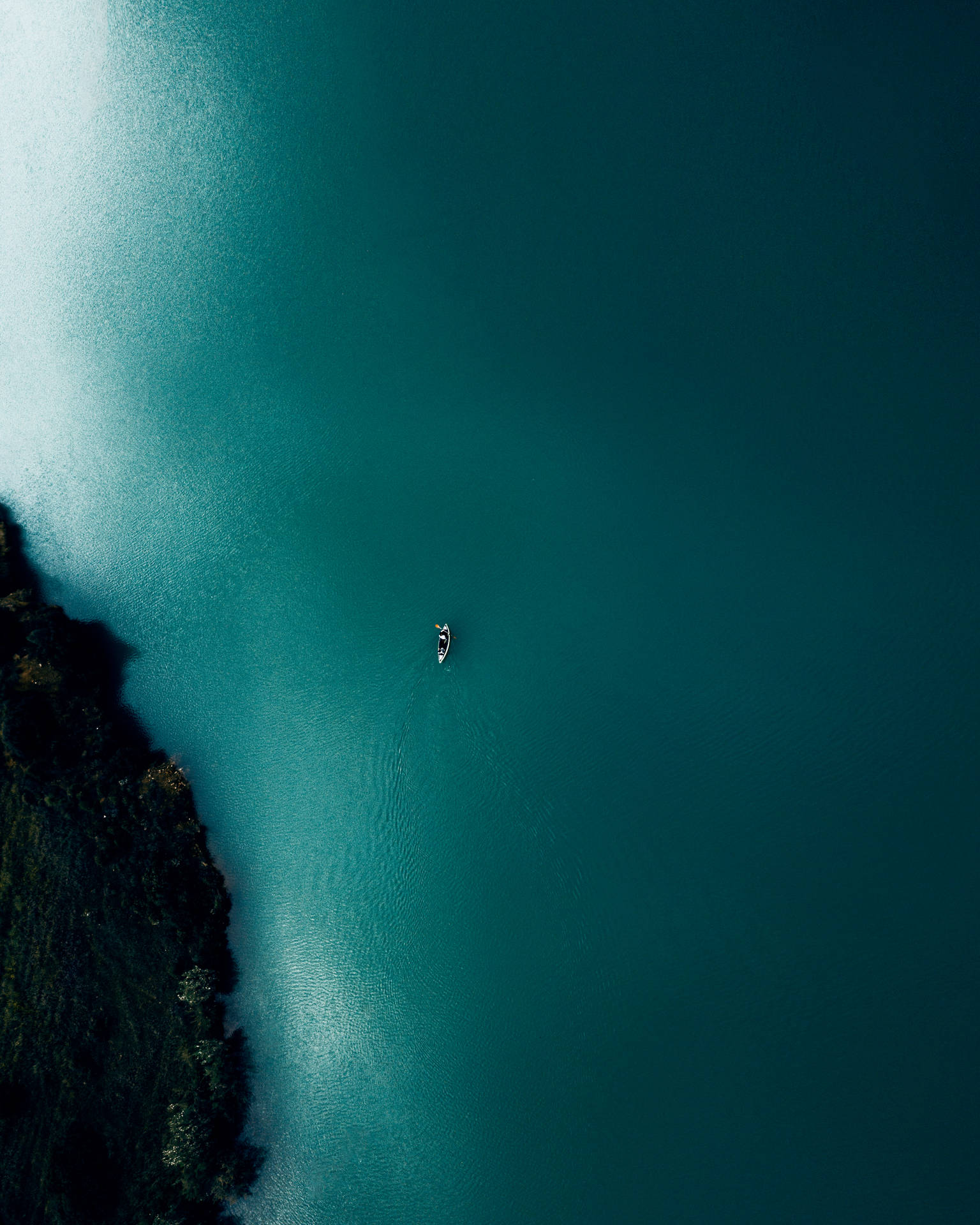 Teal Ocean And Boat