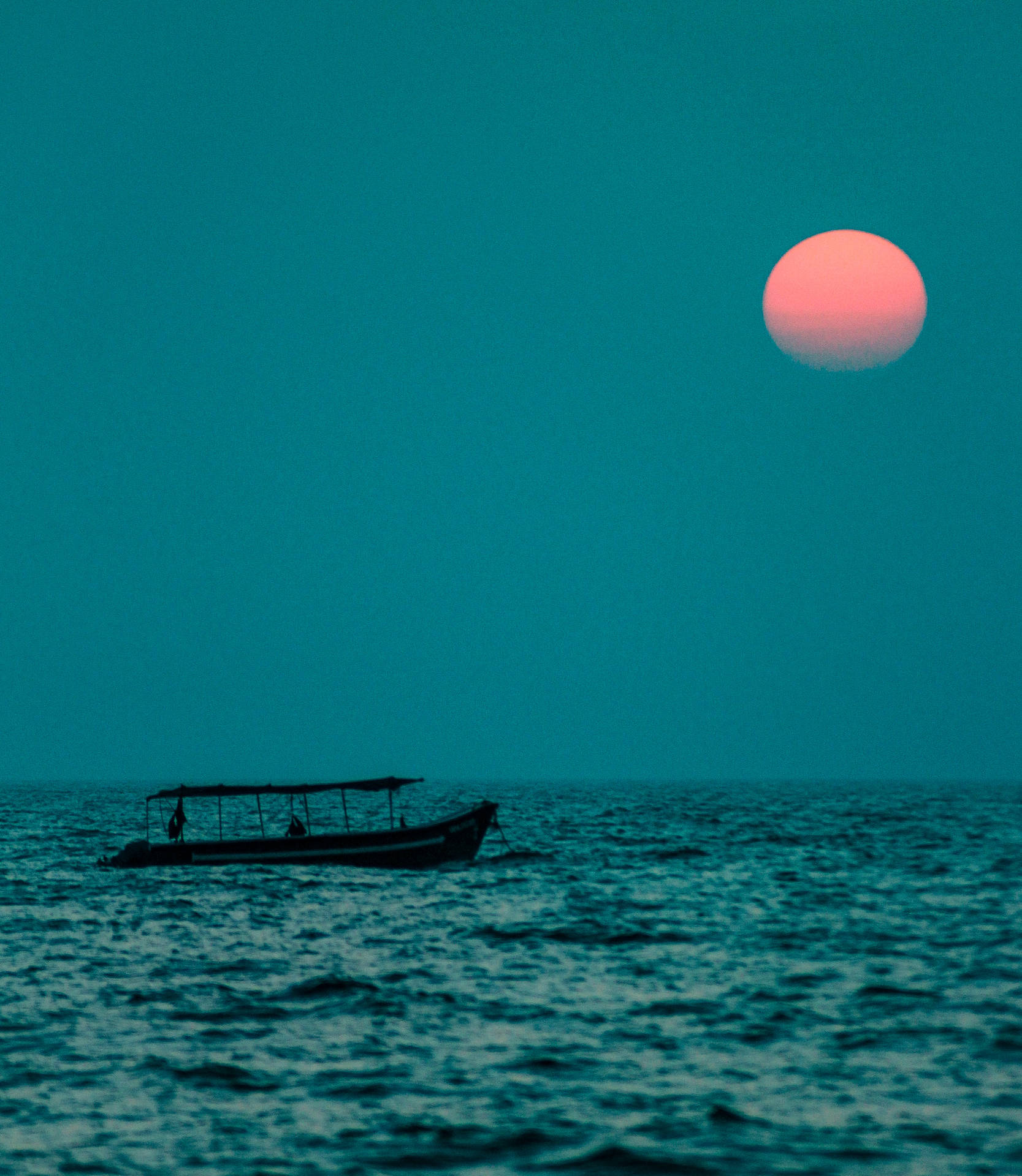 Teal Ocean And Pink Moon Background