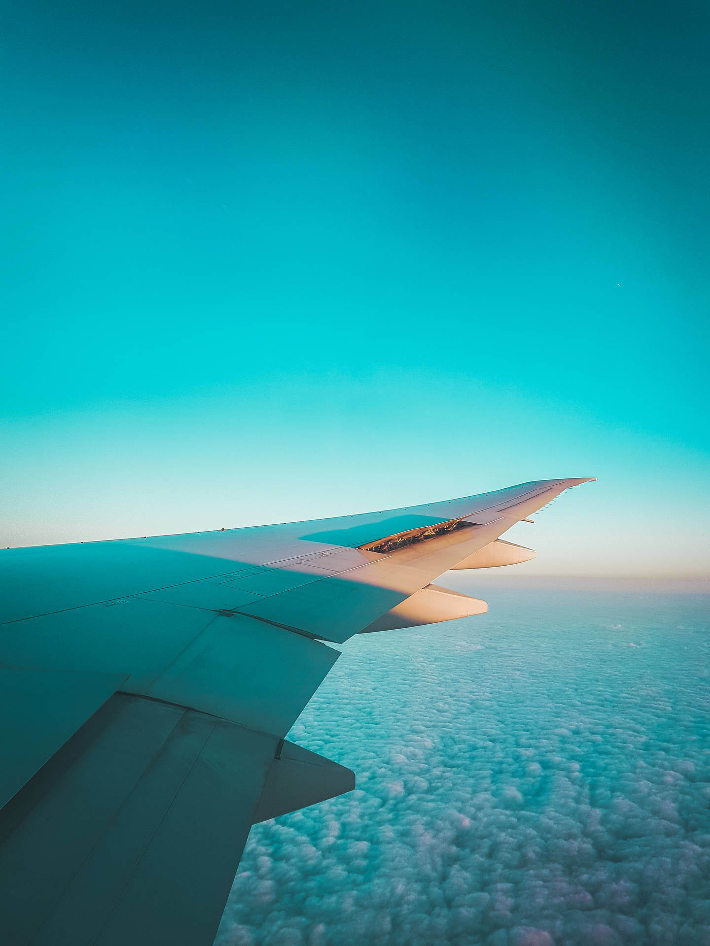 Teal Sky And Airplane Wing Background