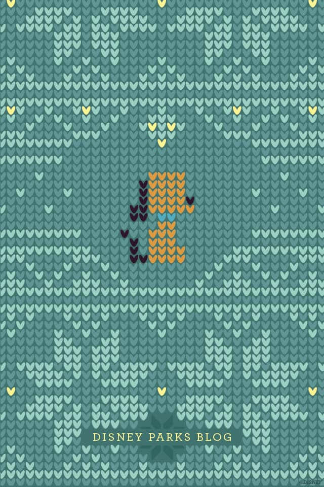 Teal Sweater Flower Shapes And A Brown Dog