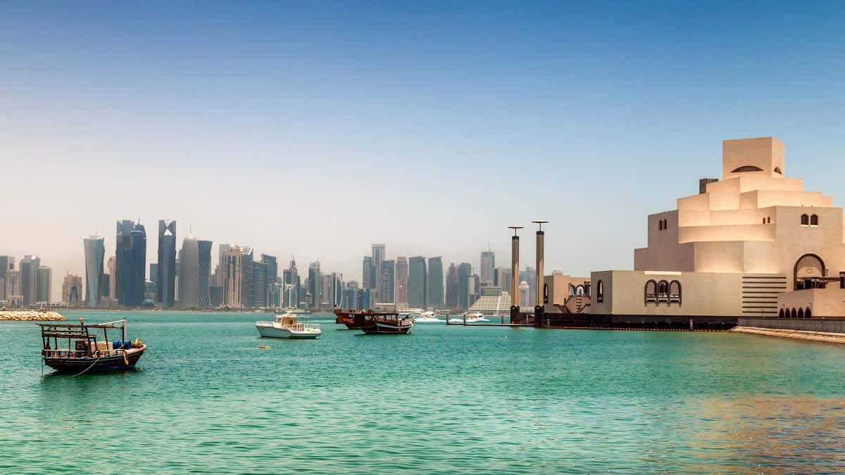 Teal Water Surrounding The Museum Of Islamic Art