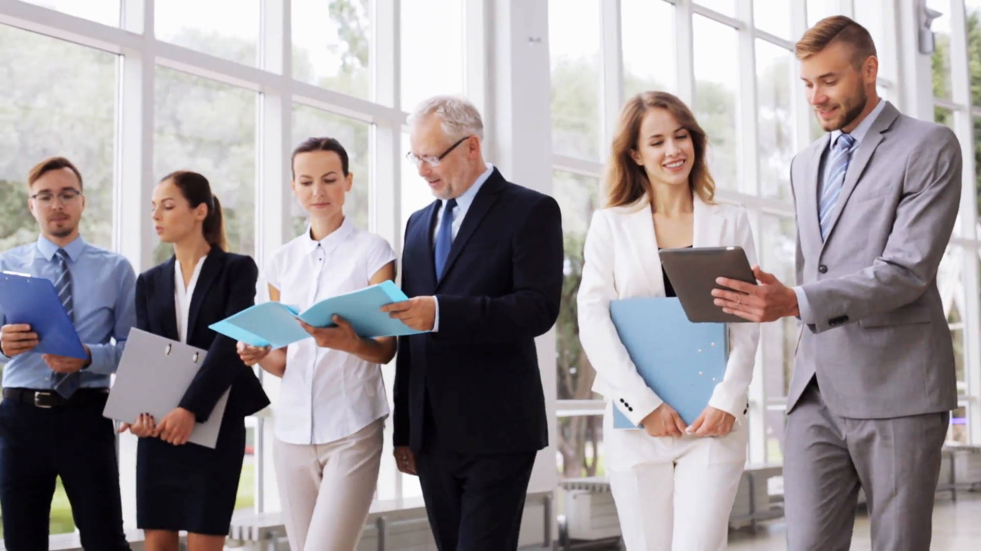 Team Holding Folders