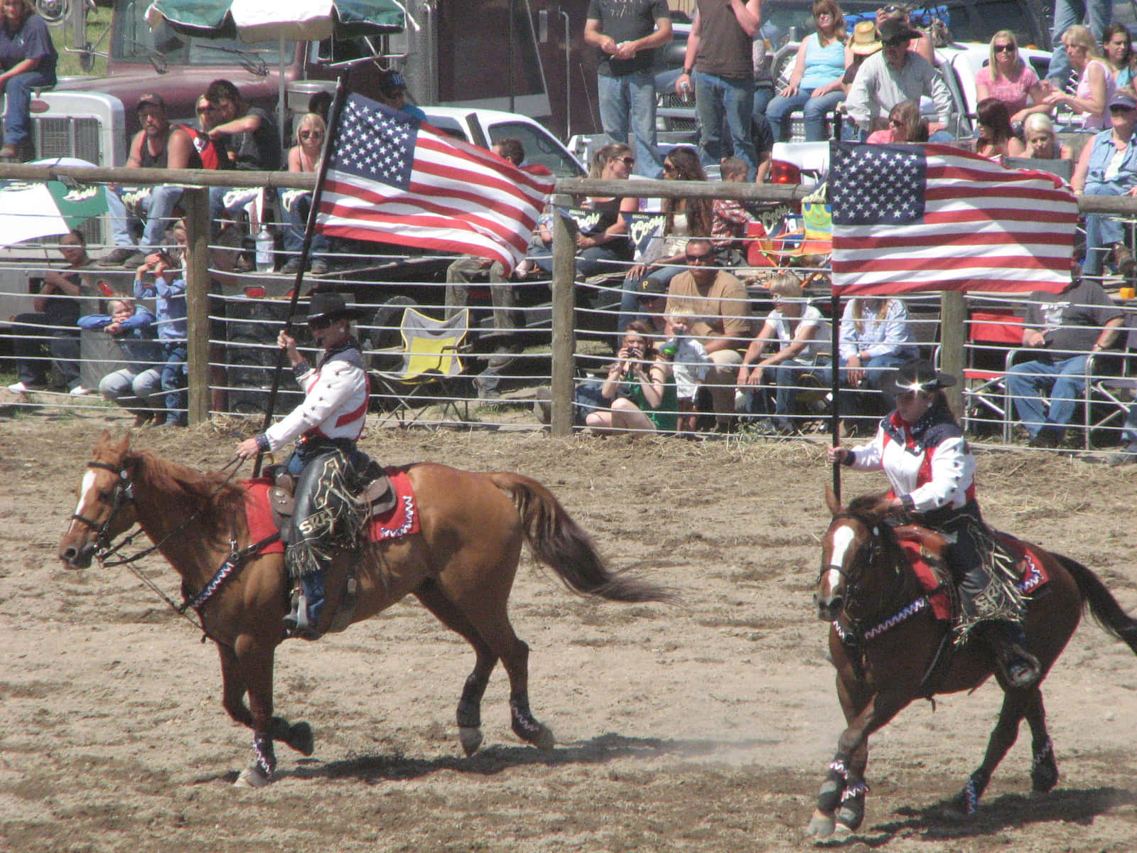 Team Roping Raising Us Flags Background