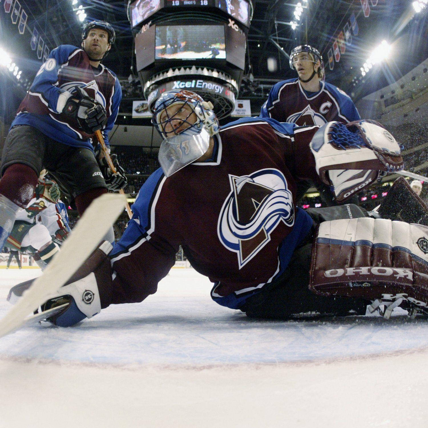 Team Spirit Of Colorado Avalanche In Action Background