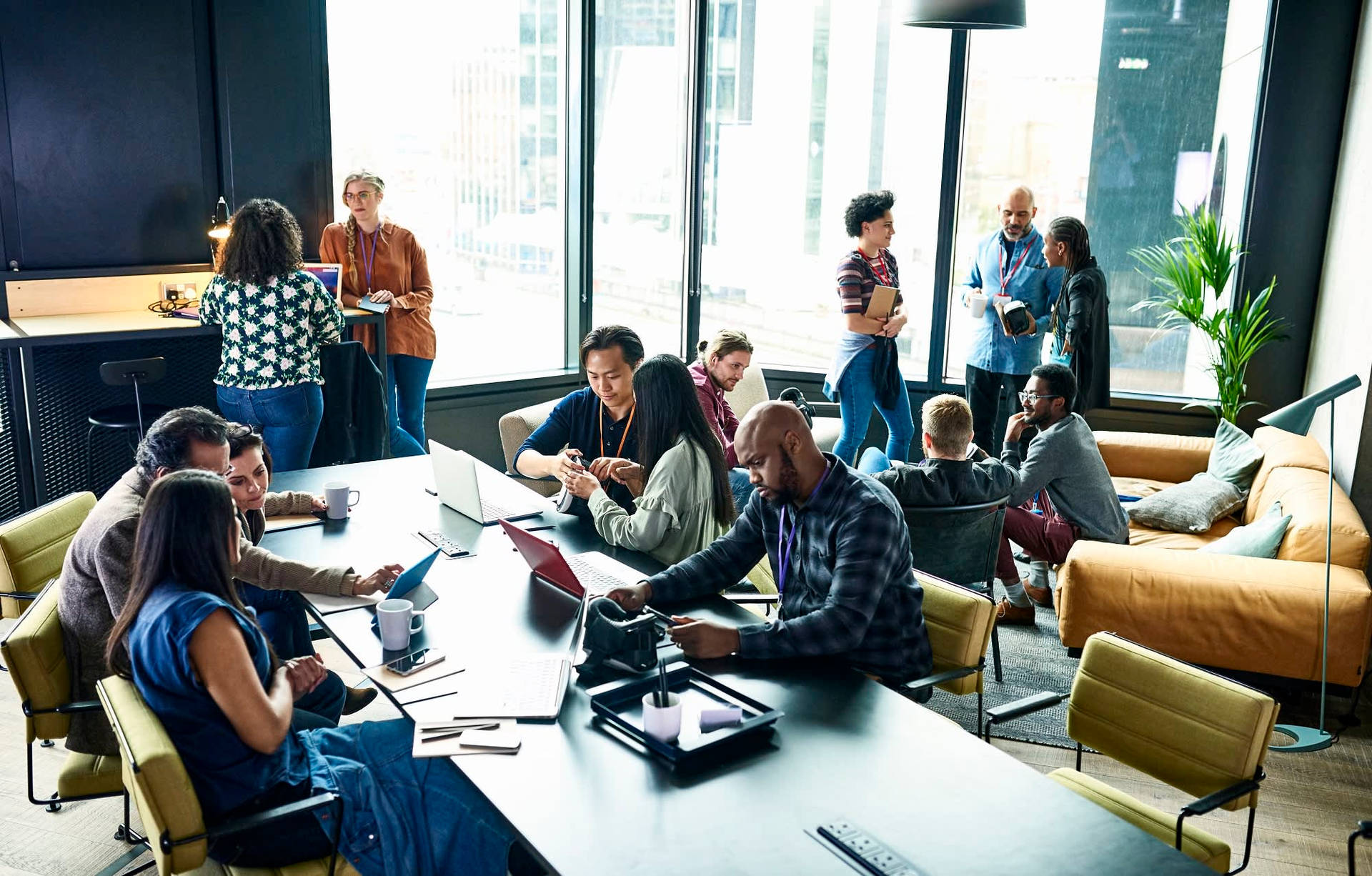 Team Working Together In Office Background