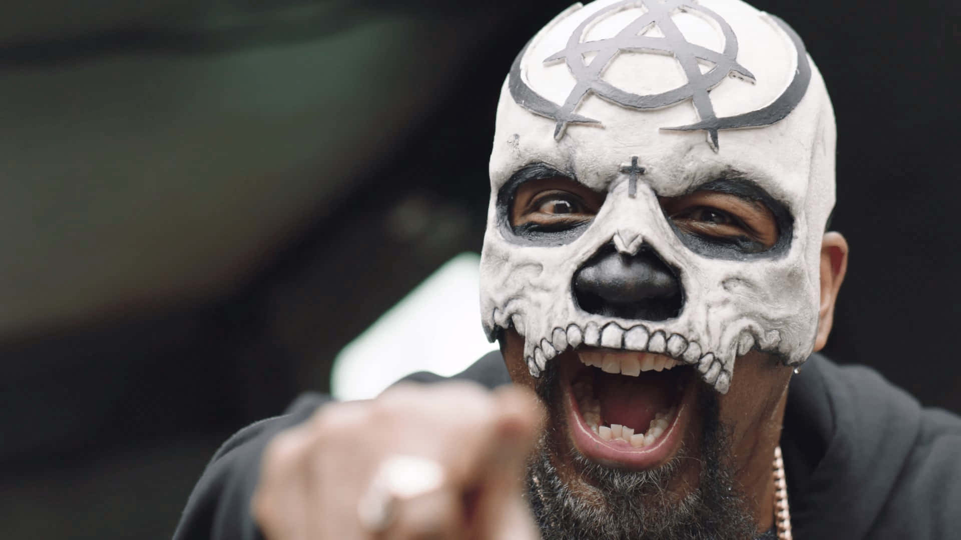 Tech N9ne Skull Paint Performance Background