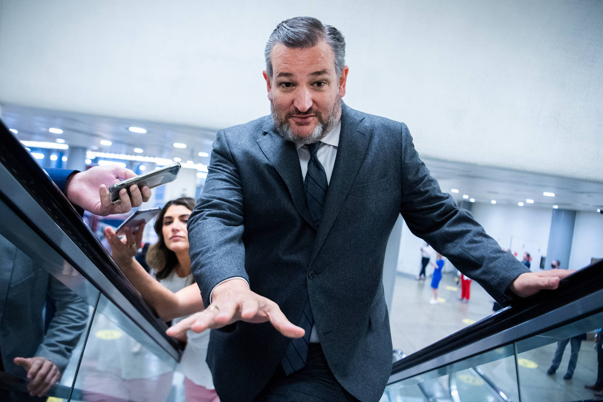 Ted Cruz Rides An Escalator