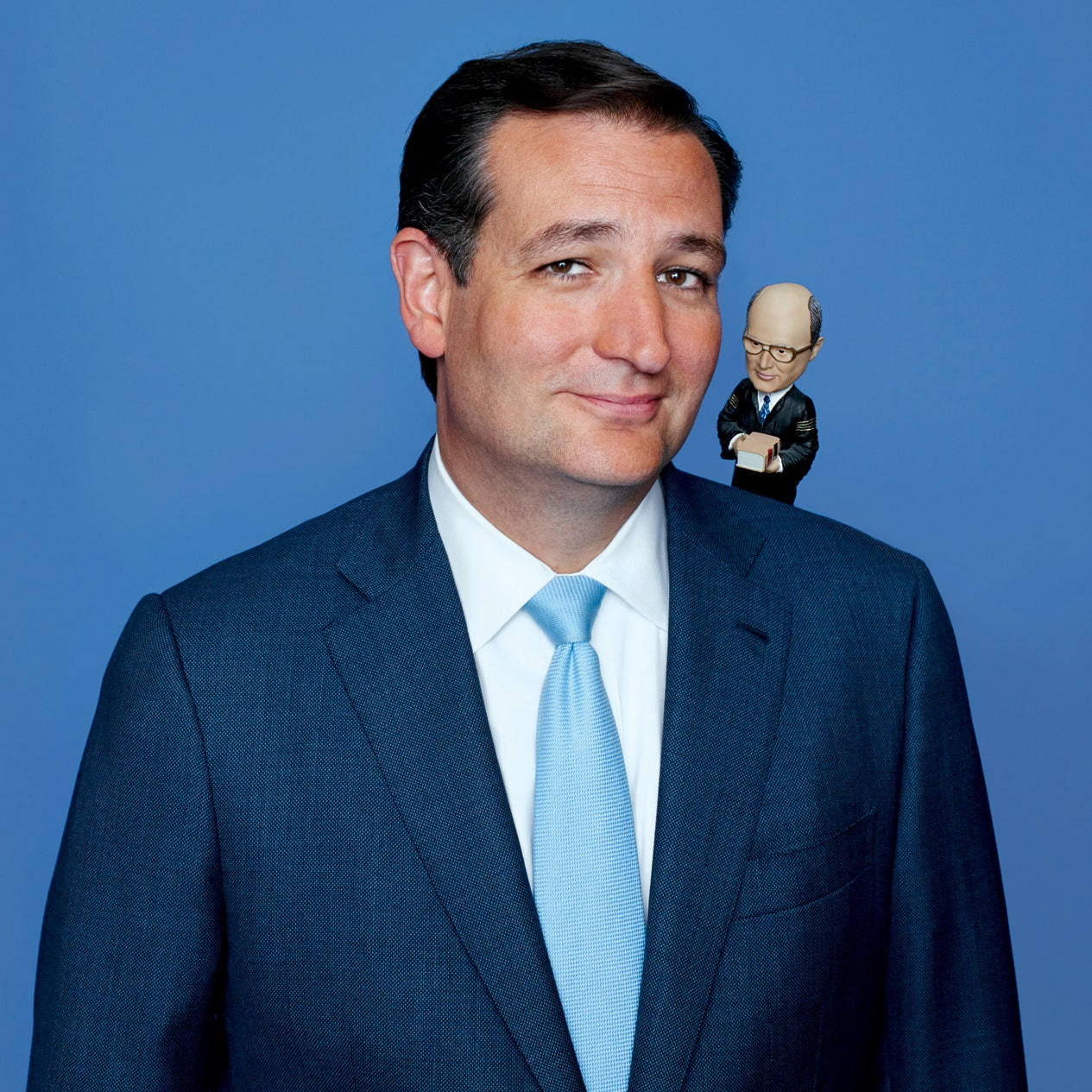 Ted Cruz With A Miniature Toy Background