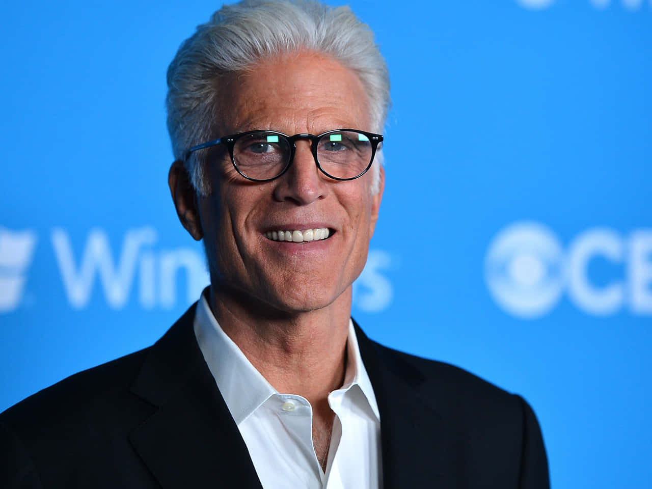 Ted Danson Enjoying Himself Outdoors Background