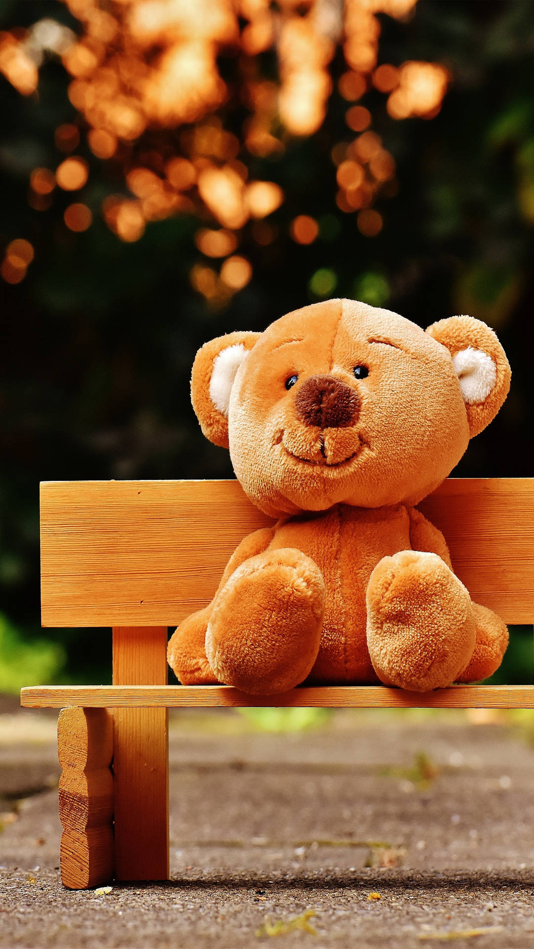 Teddy Bear In Wooden Chair Background
