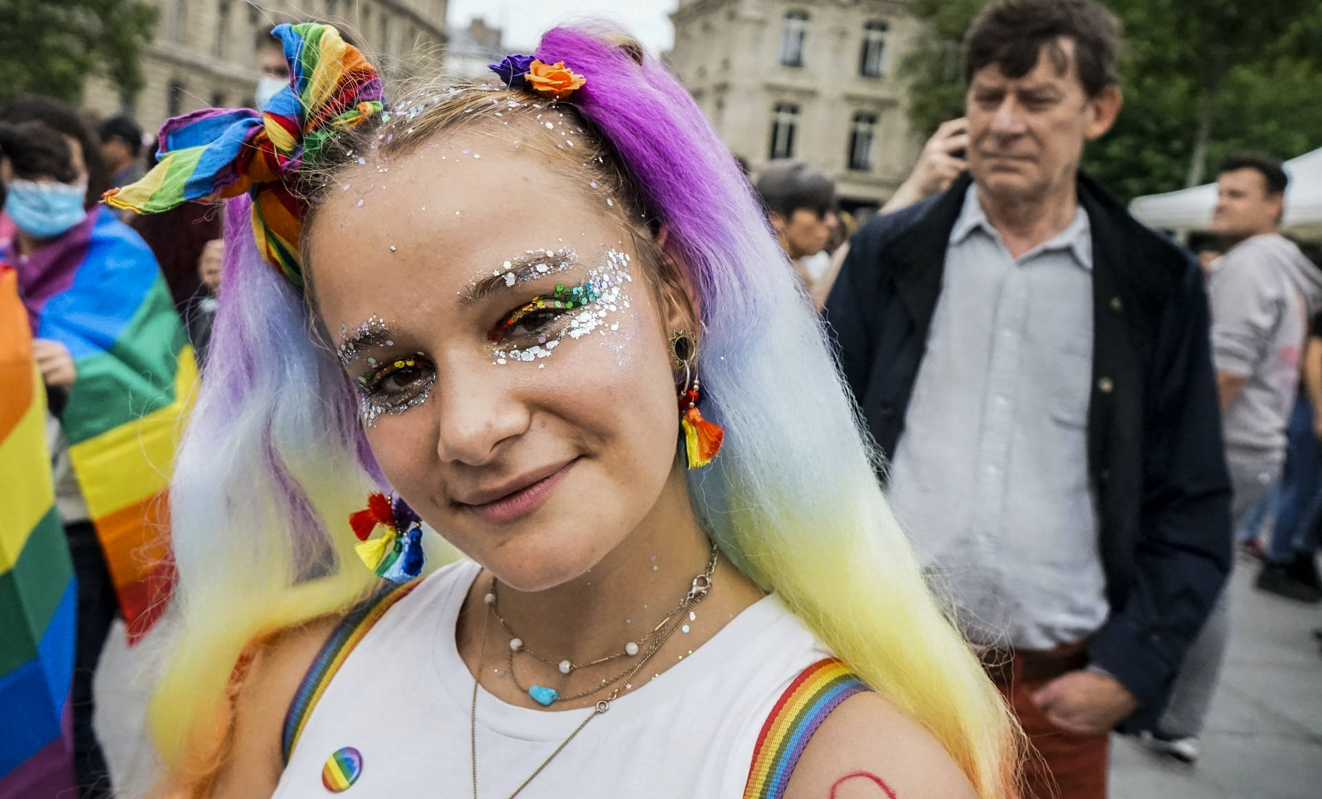 Teenage Girl With Rainbow Hair And Glitter Eyes Background